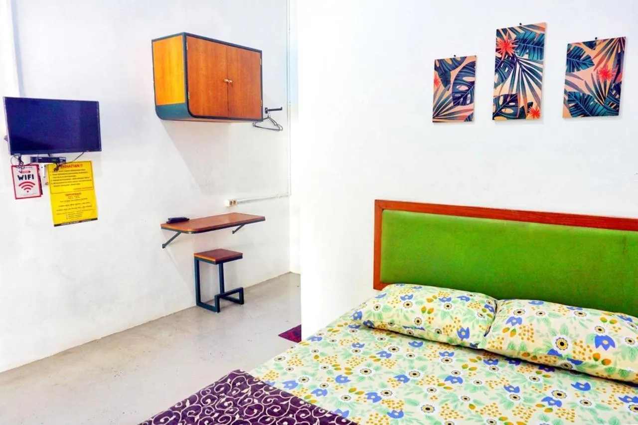 Bed in Sonosewu Guesthouse Syariah