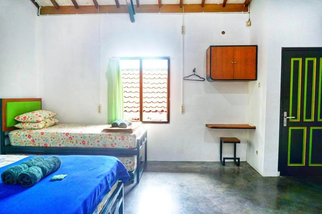 Bed in Sonosewu Guesthouse Syariah