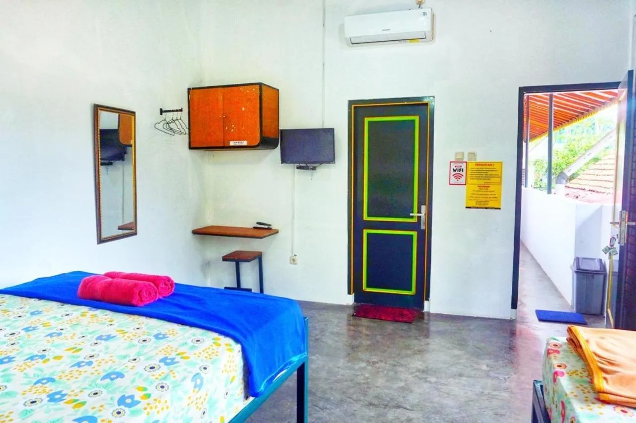 Bed in Sonosewu Guesthouse Syariah