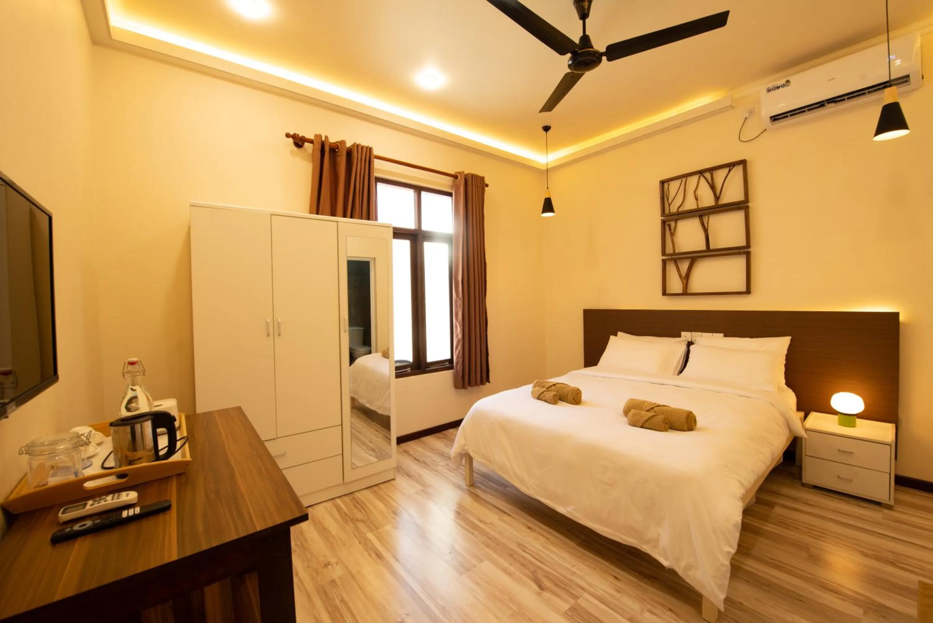 TV and multimedia, Bed in The Bilimbi Guesthouse & Inn