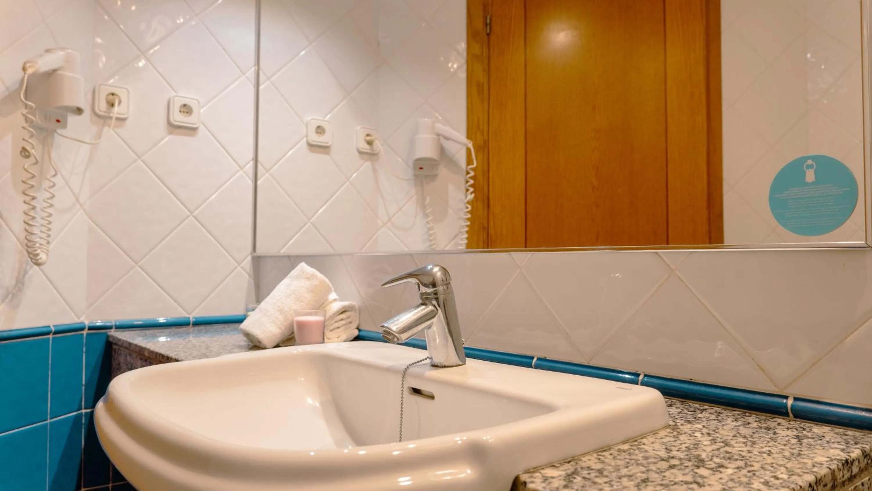 Bathroom in Rosamar Ibiza Hotel