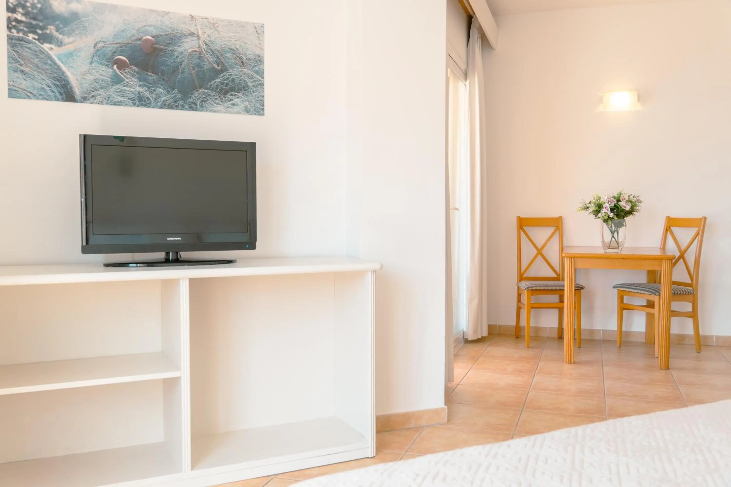 Bedroom in Rosamar Ibiza Hotel