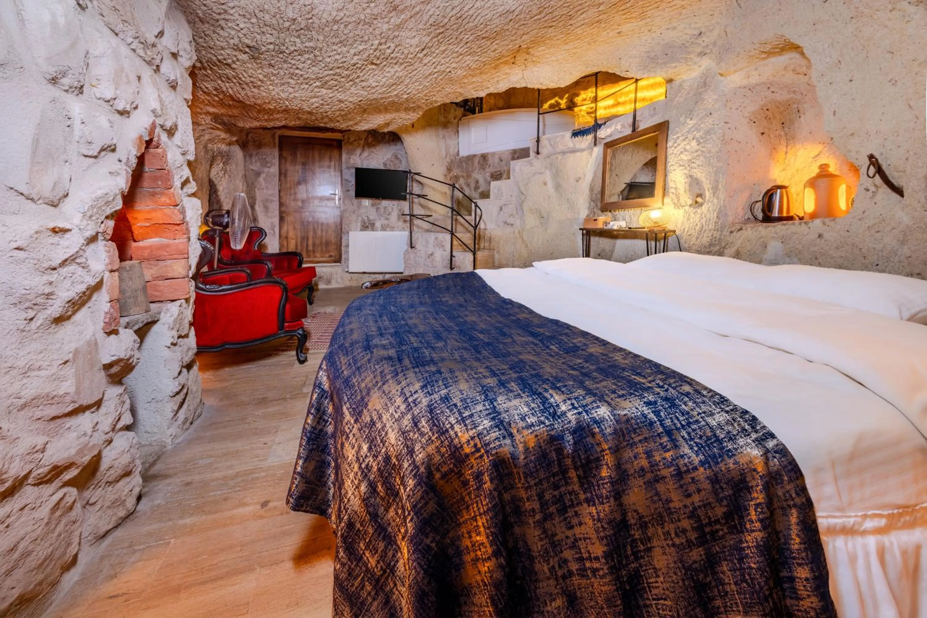 Bed in Saliche Cave Suite