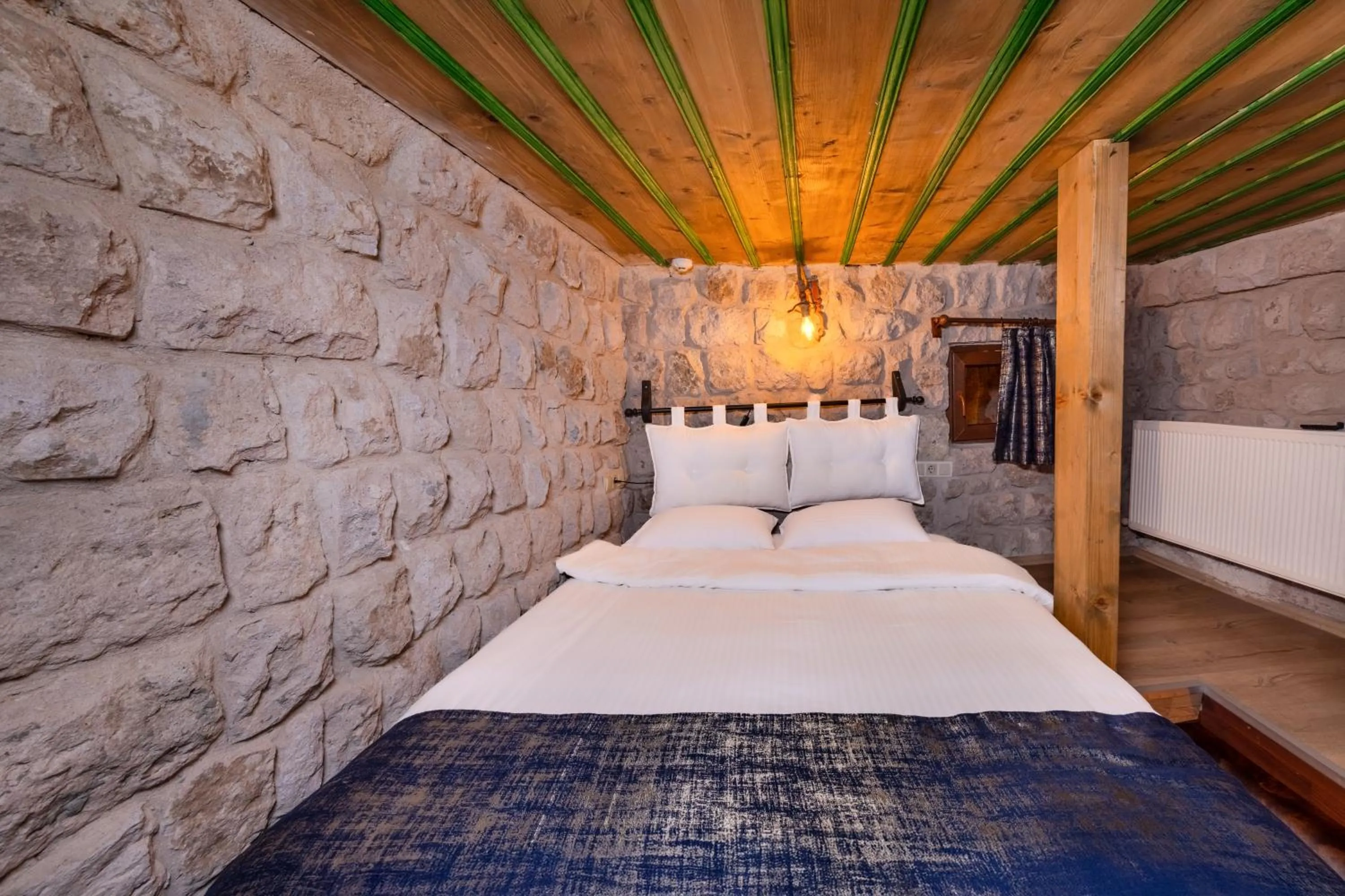 Bed in Saliche Cave Suite