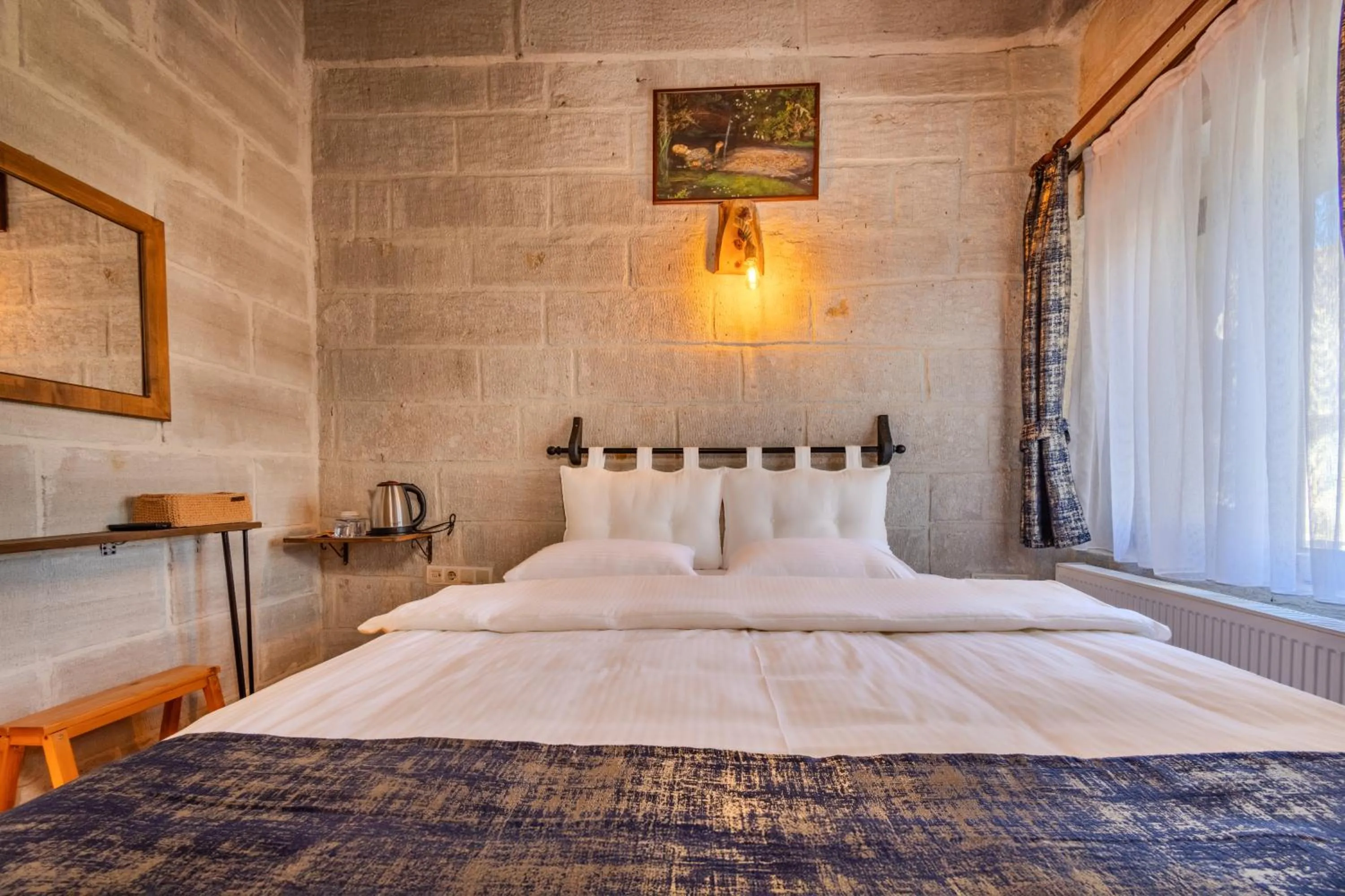 Bed in Saliche Cave Suite