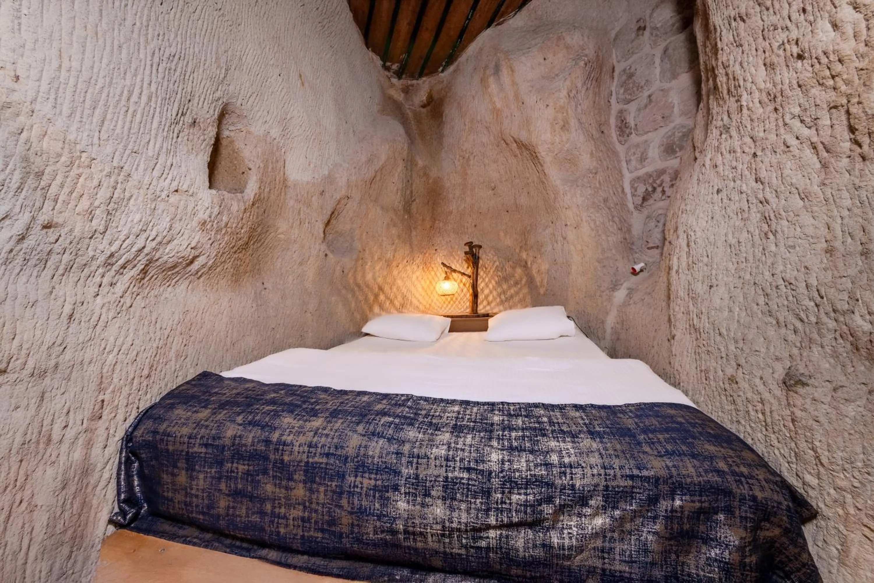 Bed in Saliche Cave Suite