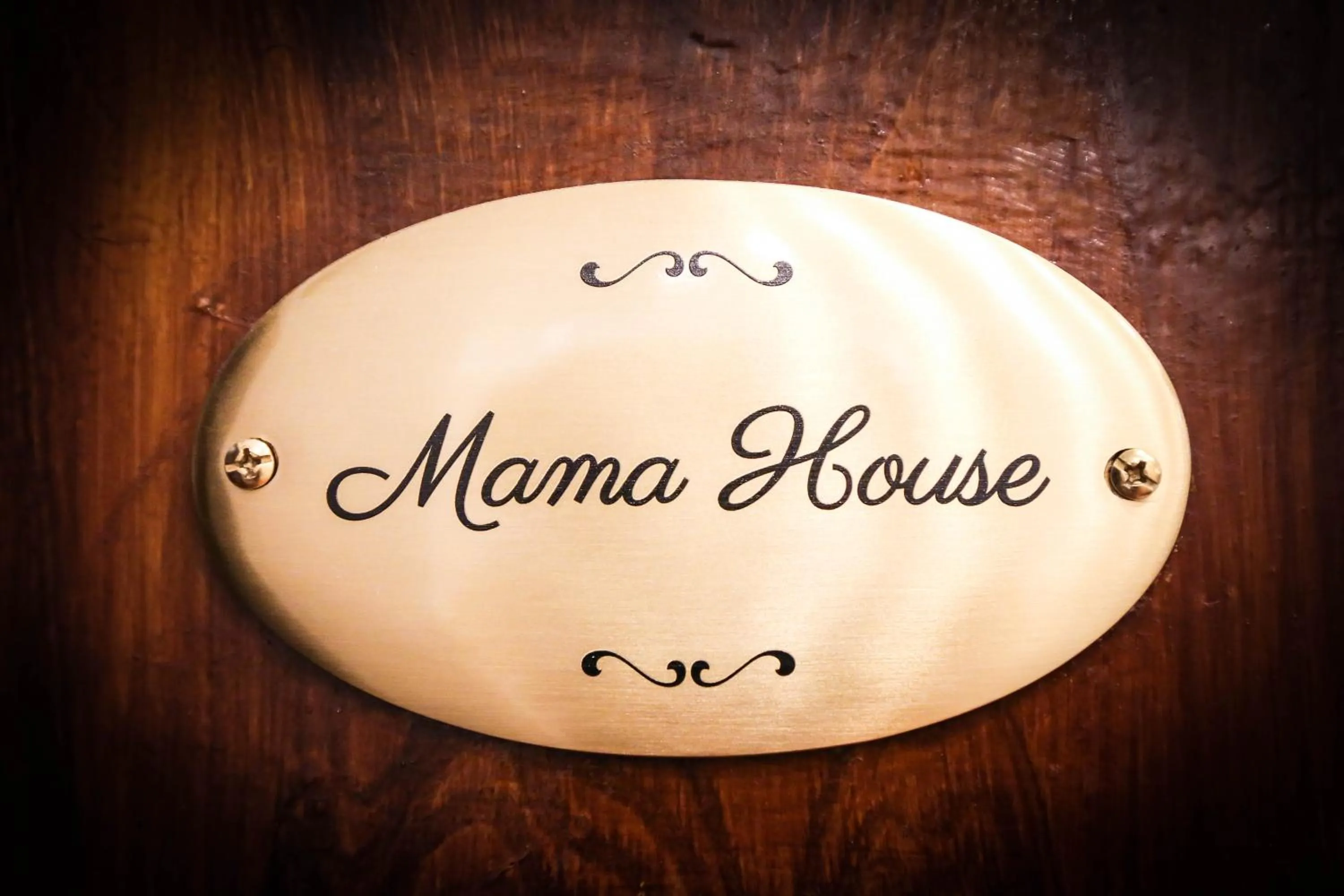 Property logo or sign in Mama House Roma