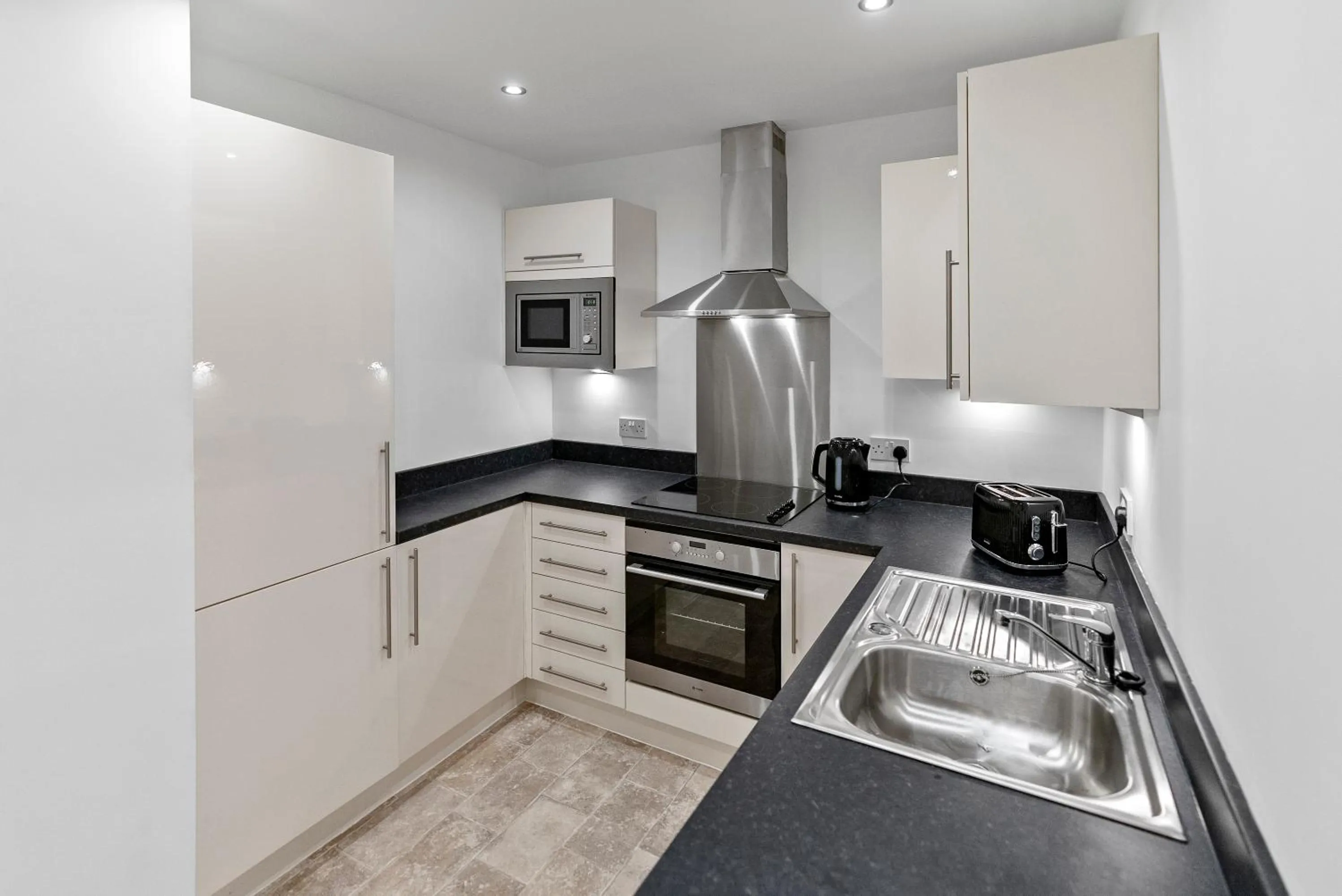 Kitchen or kitchenette in Mode Apartments Winter Gardens Blackpool