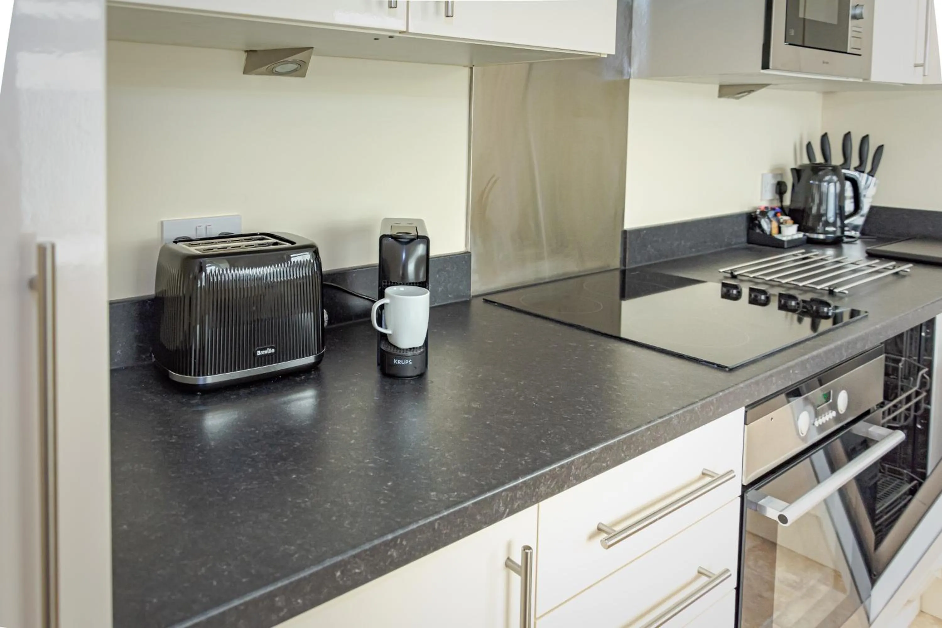 Kitchen or kitchenette in Mode Apartments Winter Gardens Blackpool