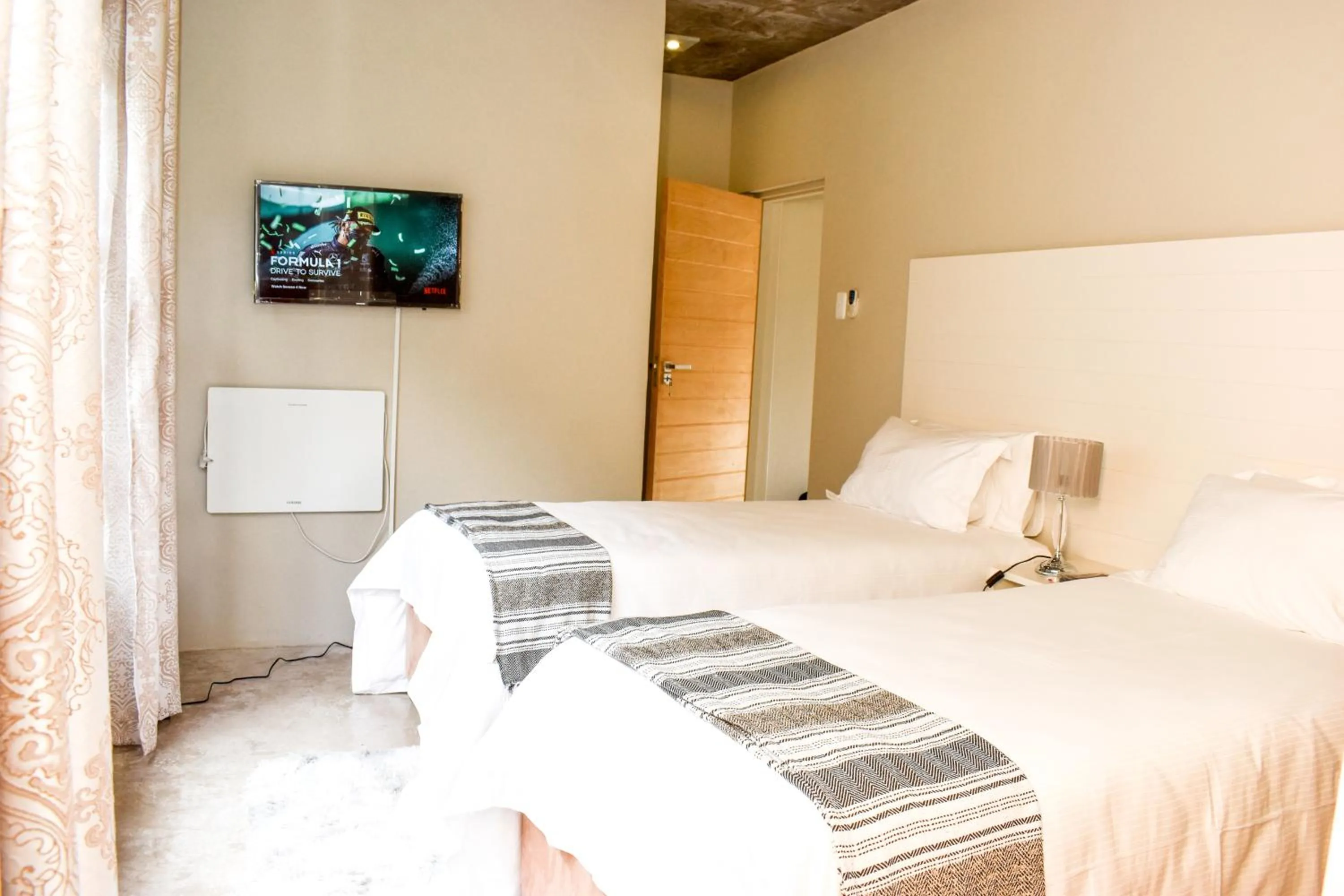 Bedroom in Amabwe Guesthouse