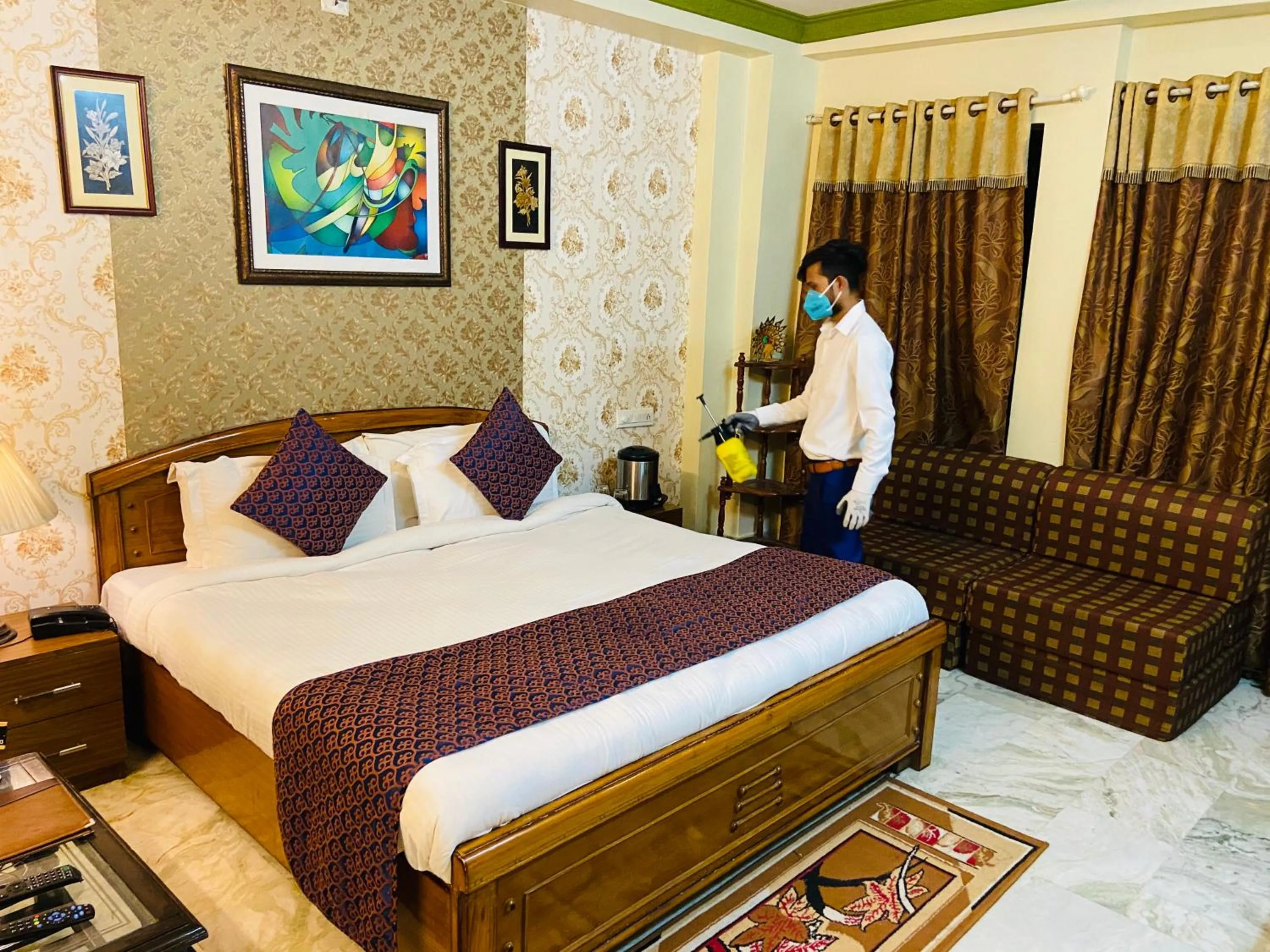 Photo of the whole room, Bed in Hotel Meenakshi Udaipur - Family Preffered Hotel