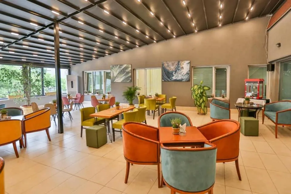 Living room in Terra Europe Brontes Hotel