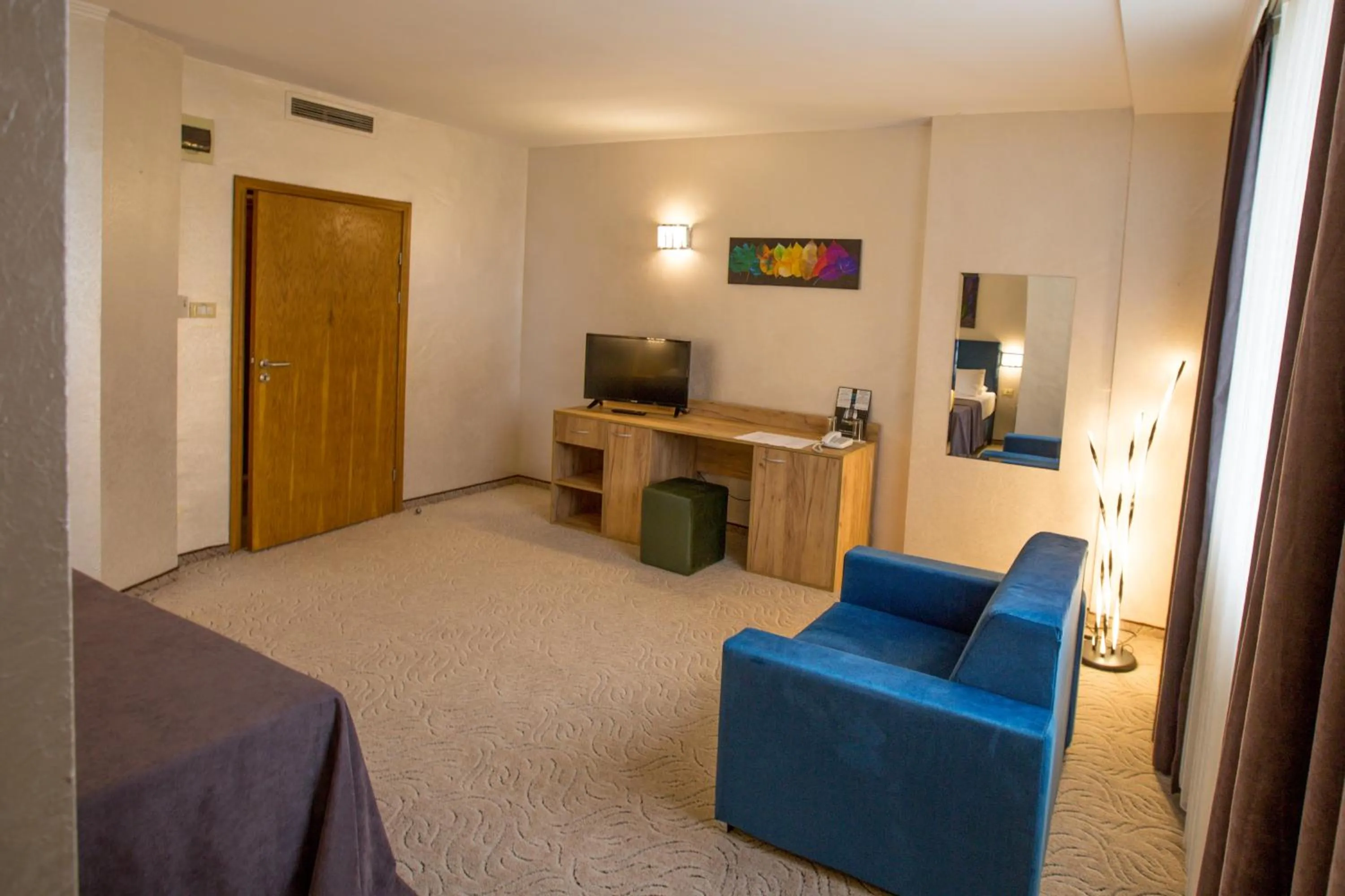 Living room in Terra Europe Brontes Hotel