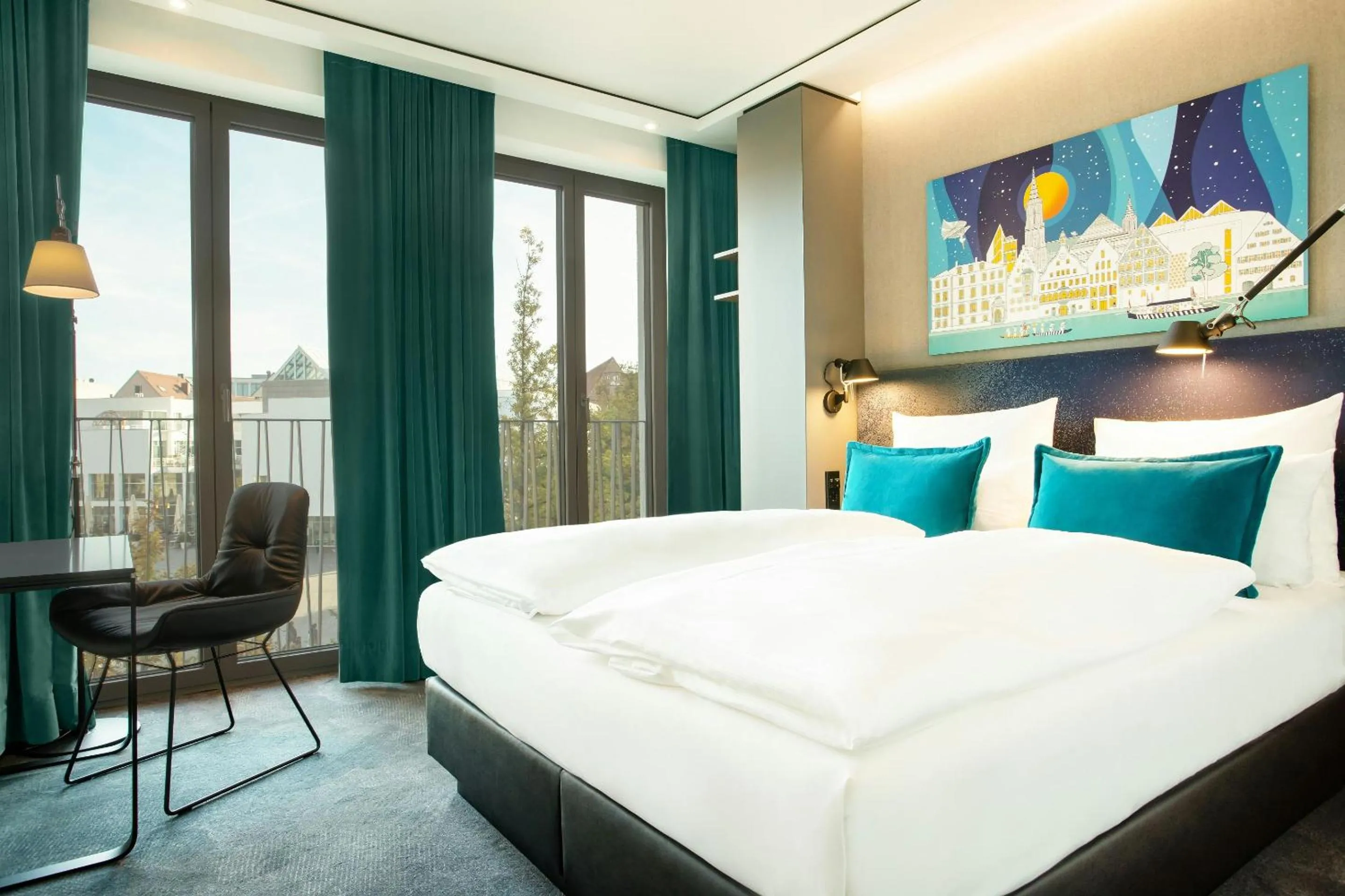 Photo of the whole room, Bed in Motel One Ulm