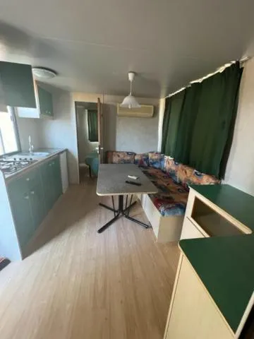 Kitchen or kitchenette in Villaggio Mithos