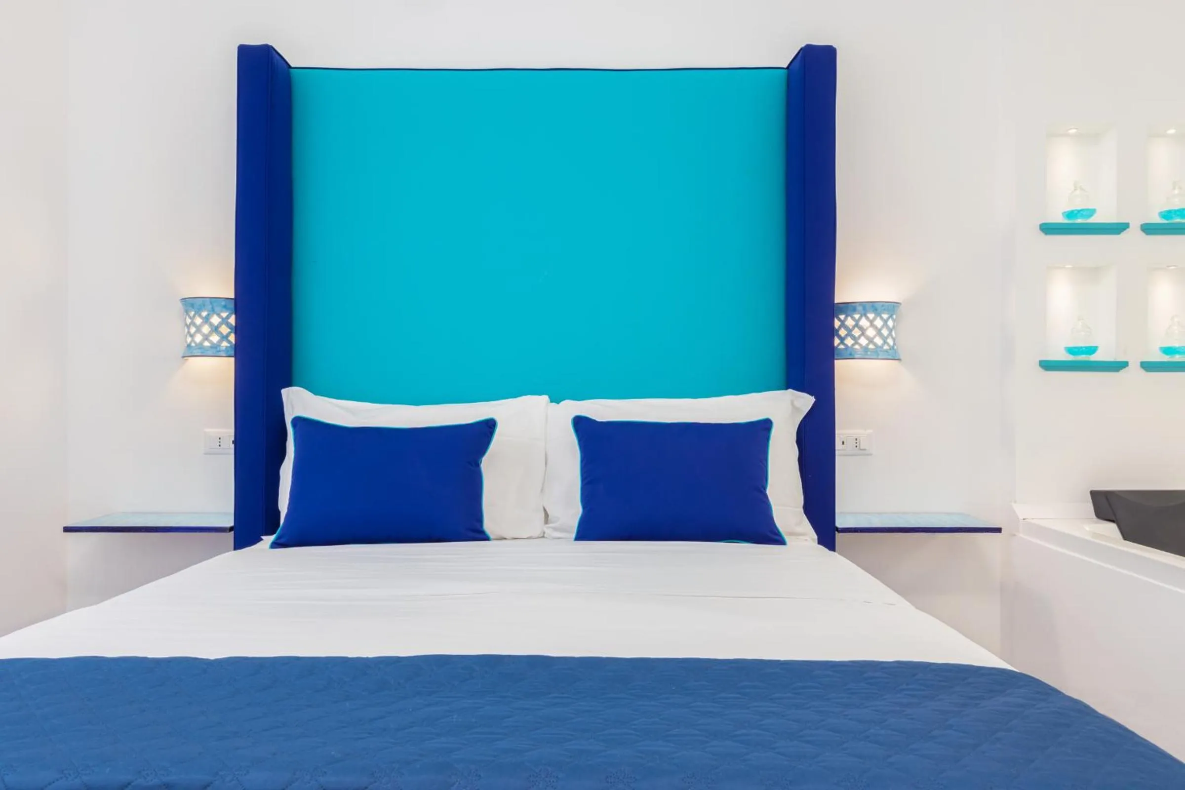 Bed in Blue Splendor Sorrento Apartment
