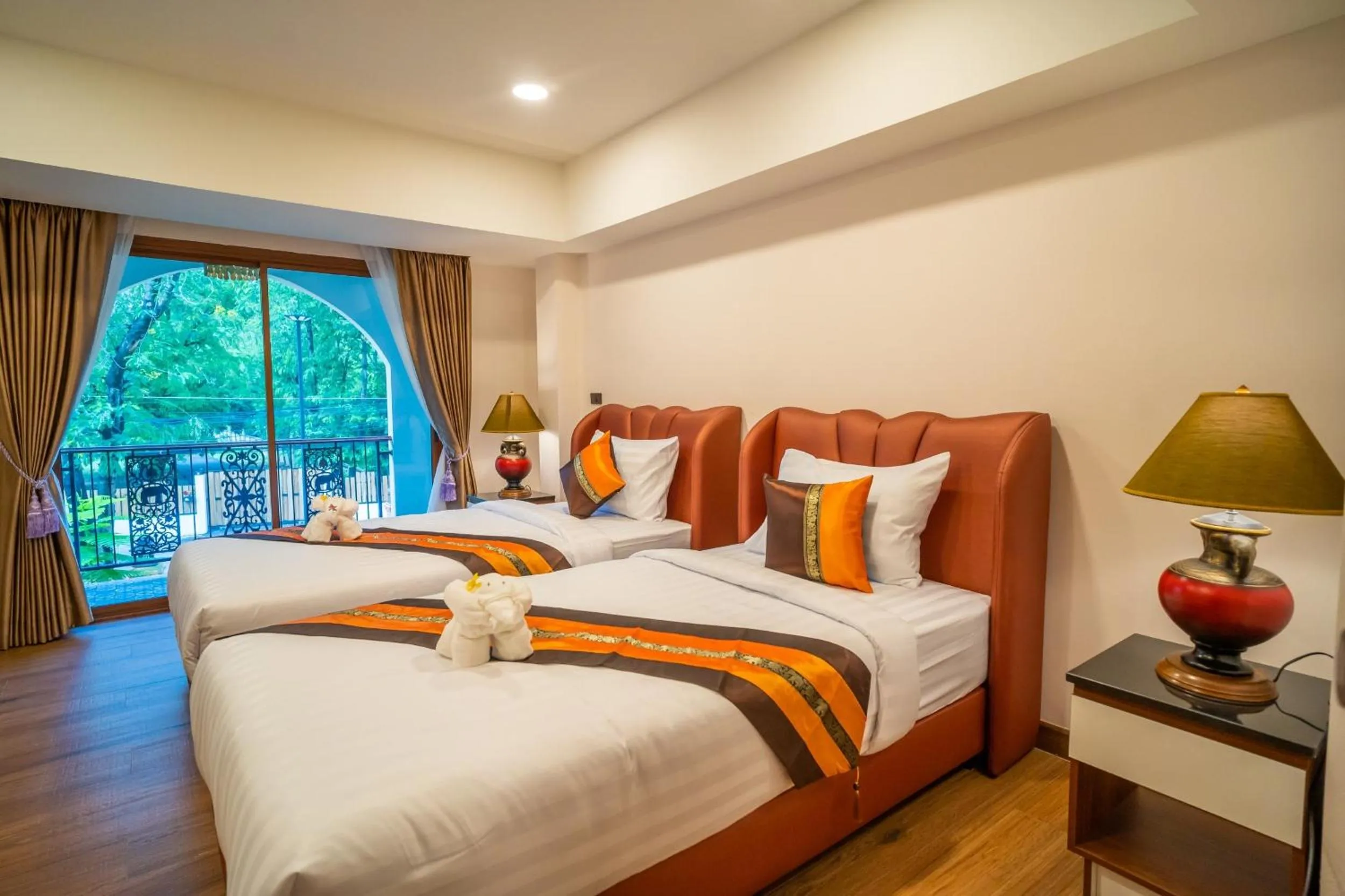 Photo of the whole room, Bed in Siri Nakornpink Chiang Mai Hotel SHA Plus