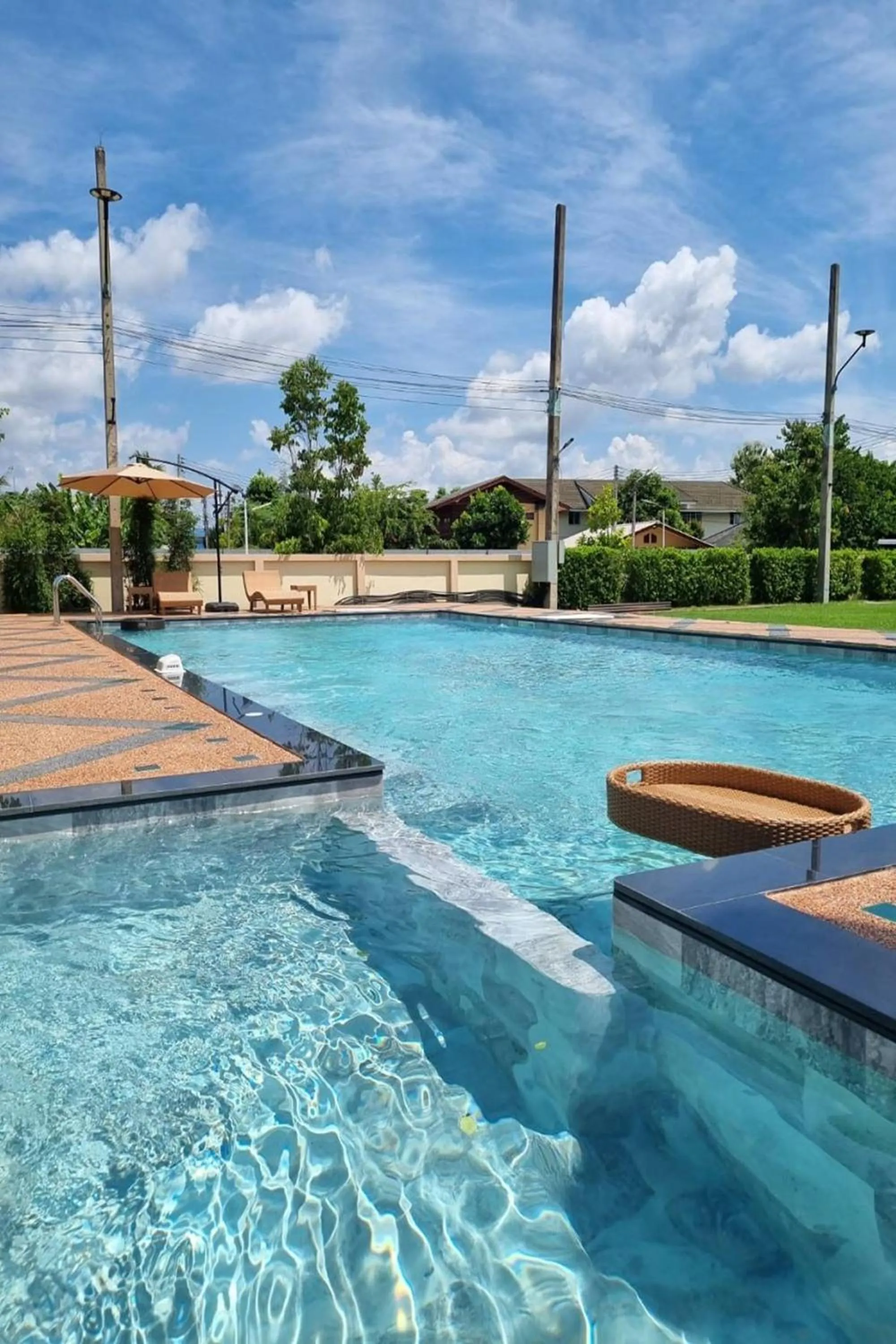 Swimming pool in Siri Nakornpink Chiang Mai Hotel SHA Plus
