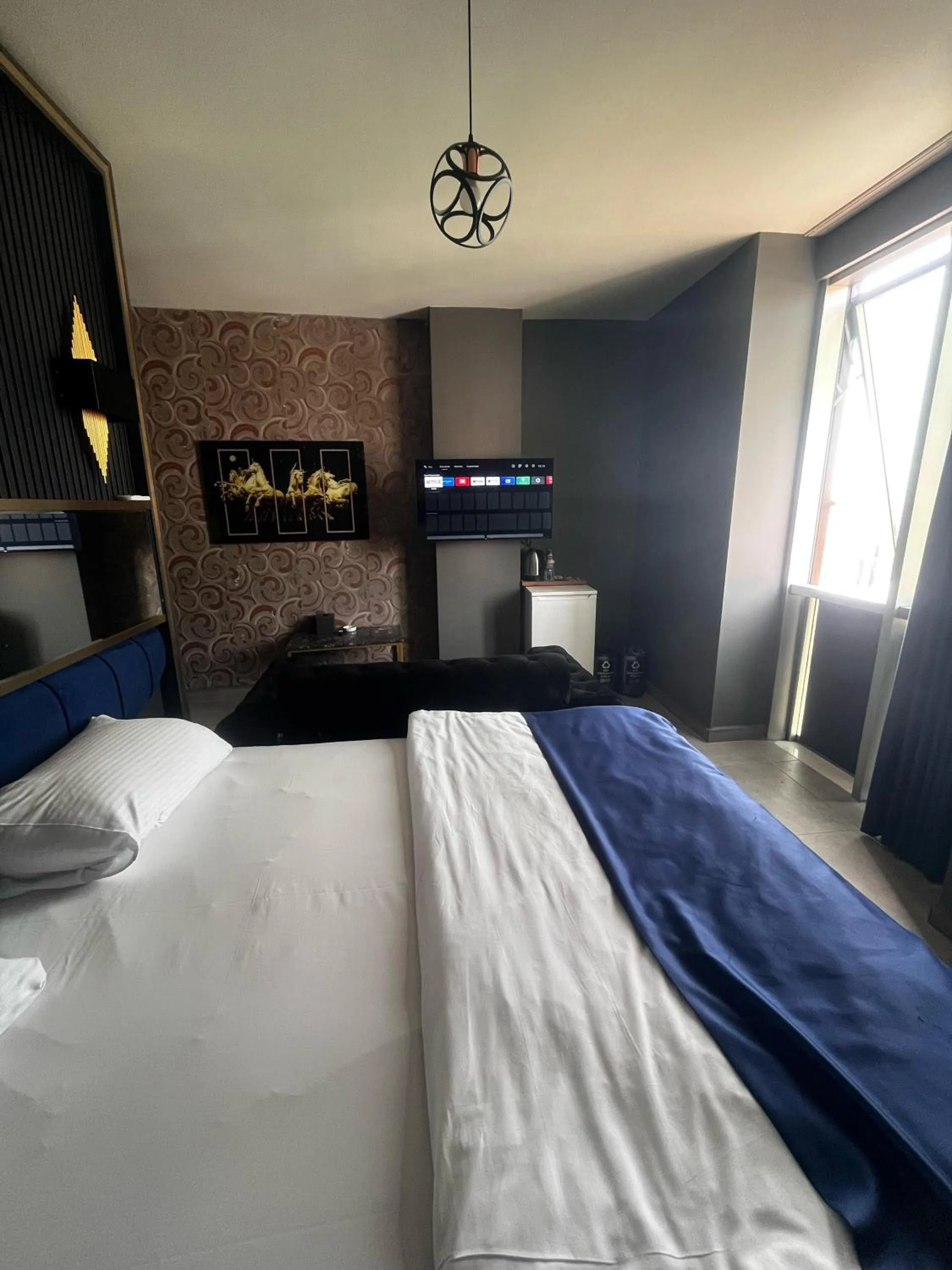 Bed in 216 Hill Suites