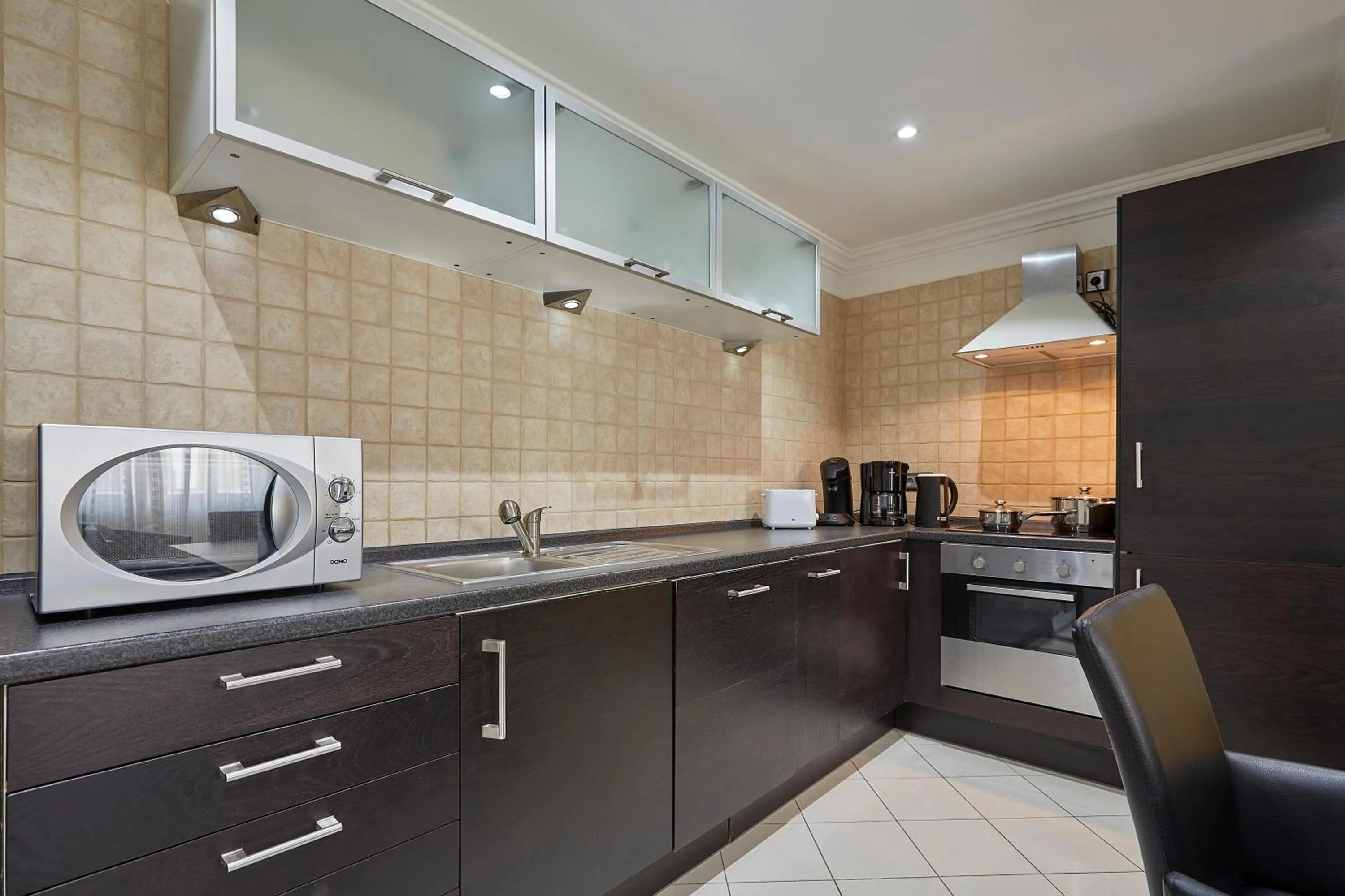 kitchen in The Queen Luxury Apartments - Villa Cortina