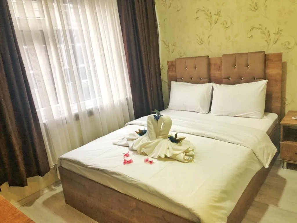 Bed in BIG MOLLS HOTEL