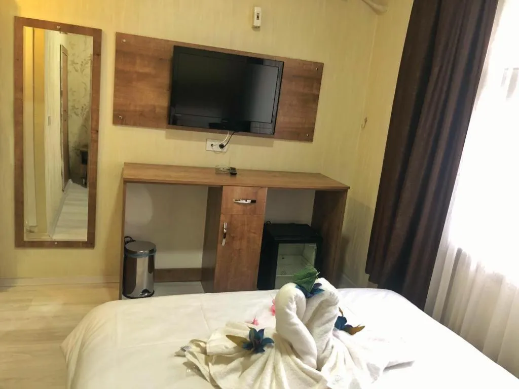 Bed in BIG MOLLS HOTEL