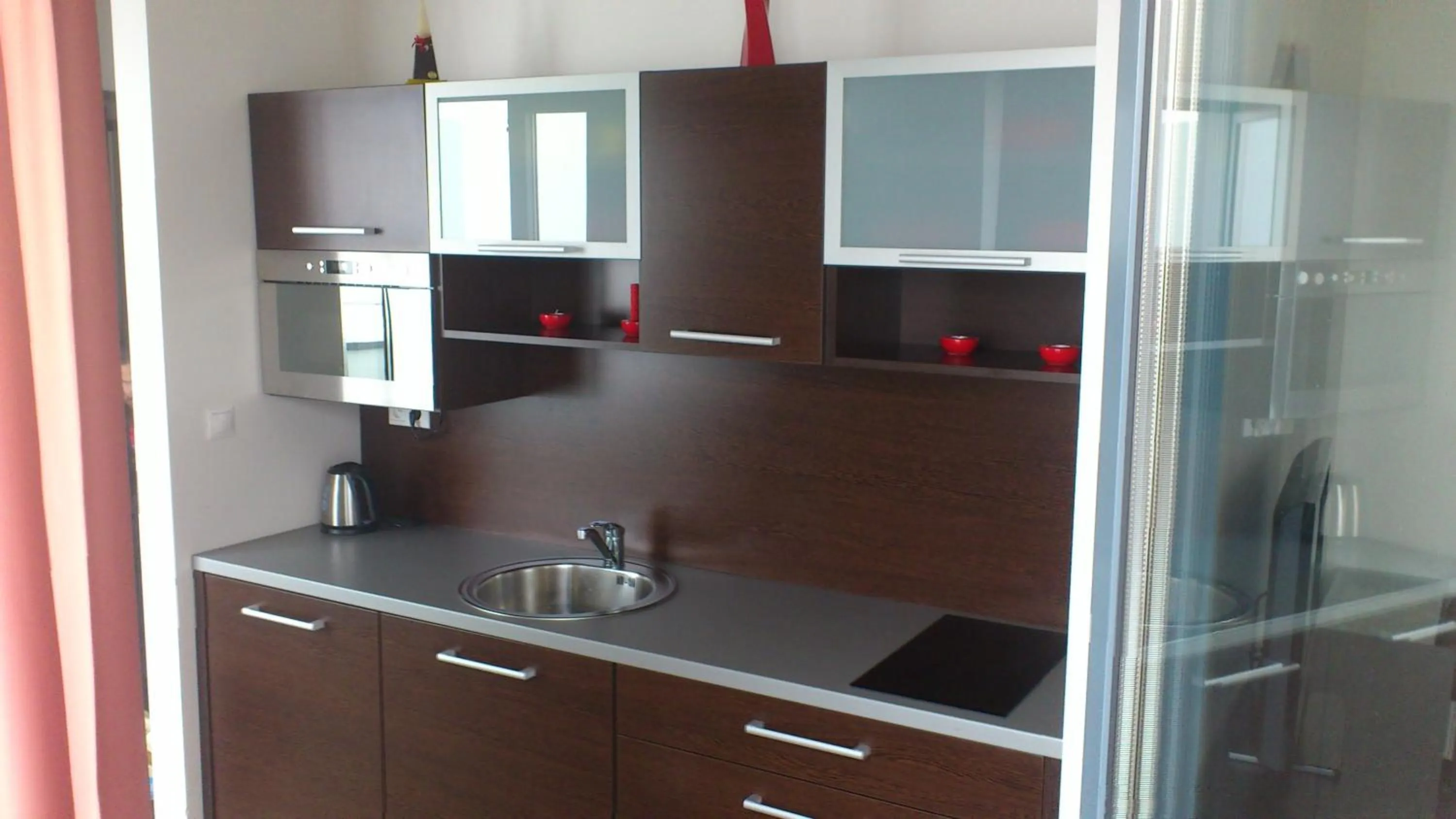 Kitchen or kitchenette in Apartman Panorama 805