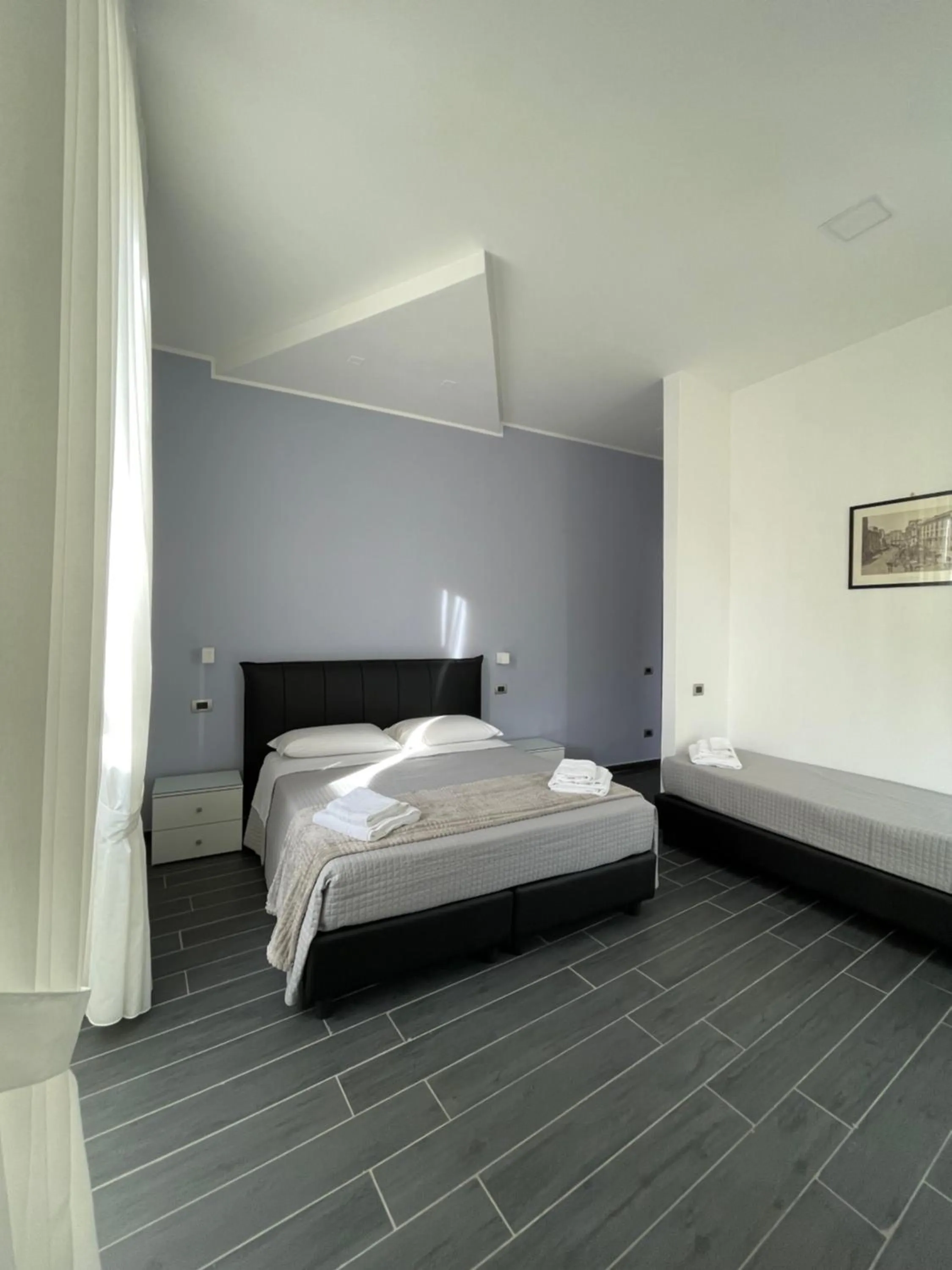 Bed in Le Porte di Napoli - Rooms