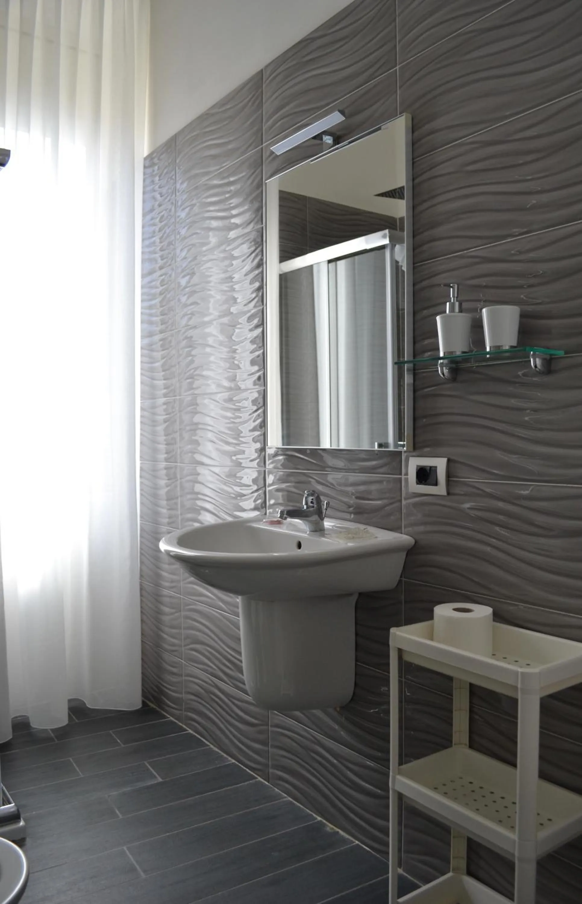 Bathroom in Le Porte di Napoli - Rooms