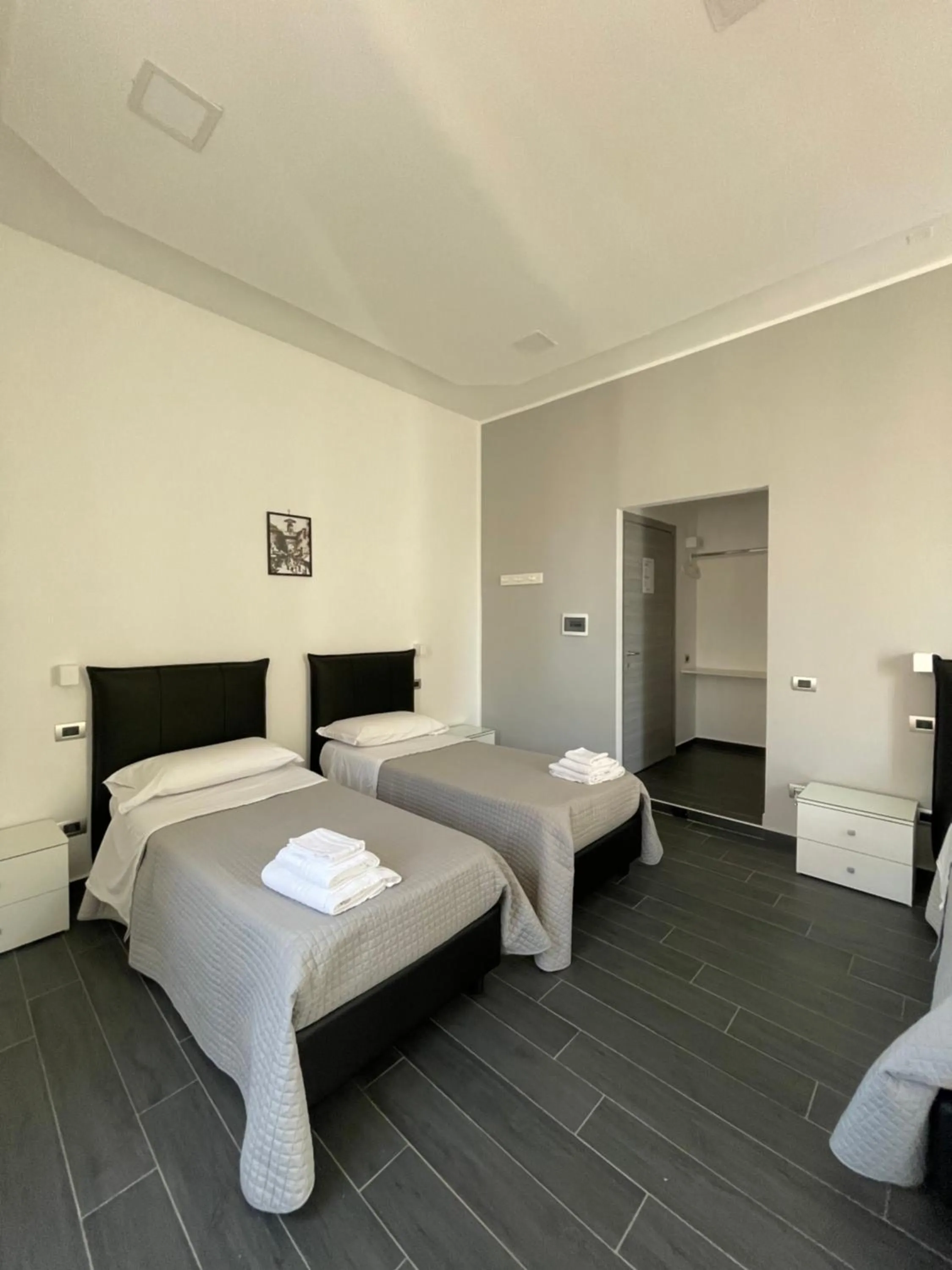 Bed in Le Porte di Napoli - Rooms