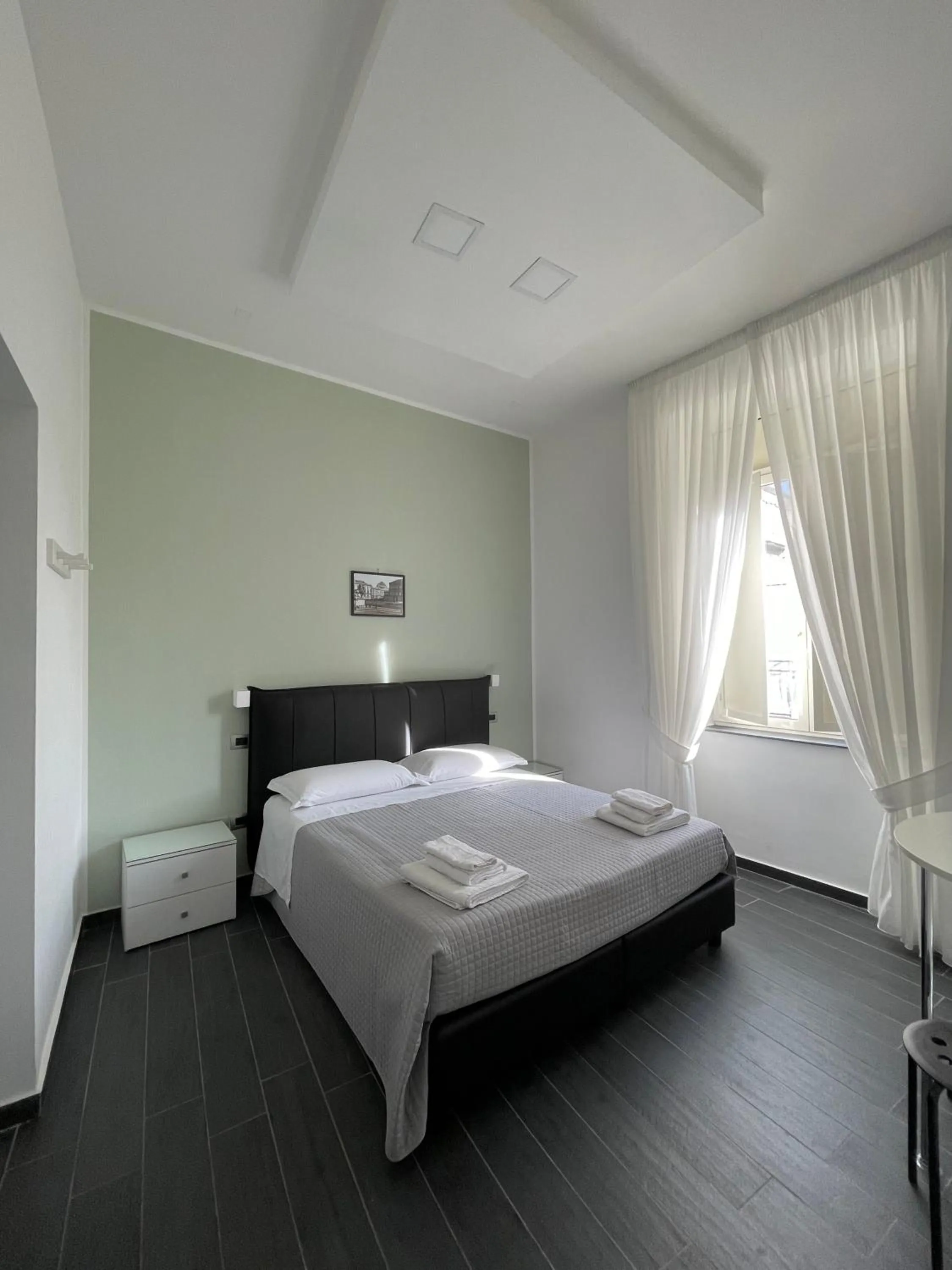 Bed in Le Porte di Napoli - Rooms