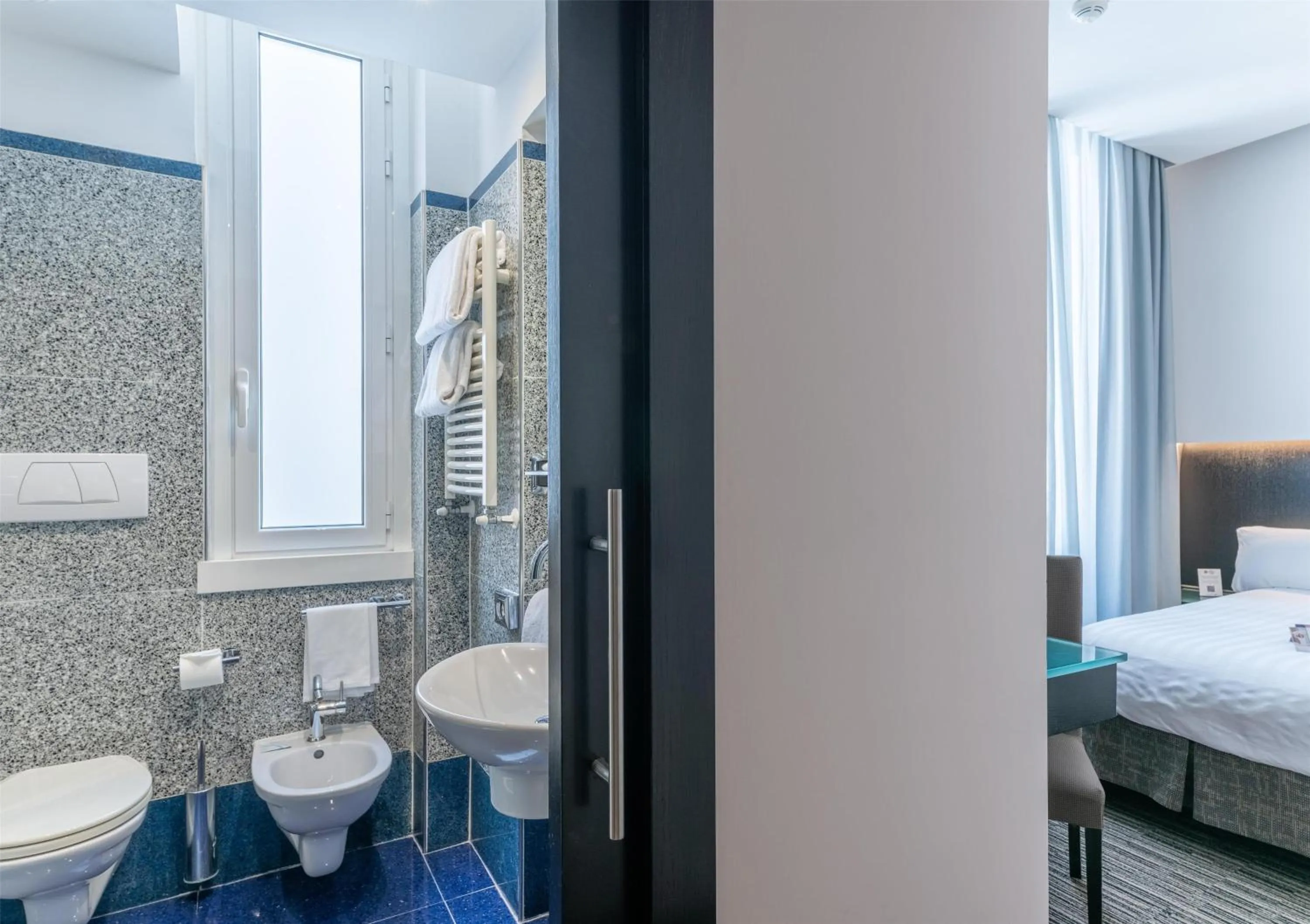 Bathroom in Best Western Plus Hotel Universo