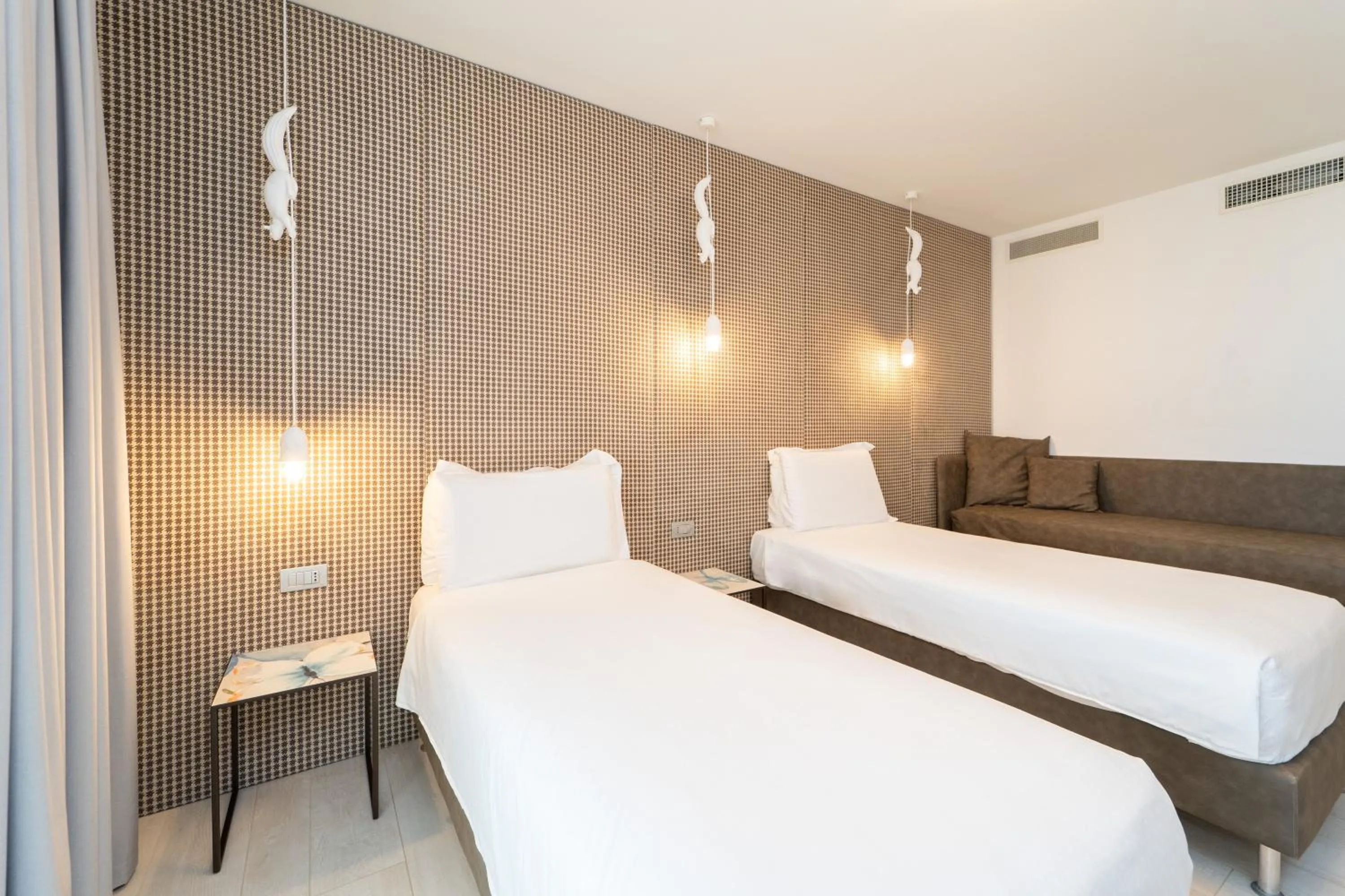 Bed in Bibione Palace Hotel