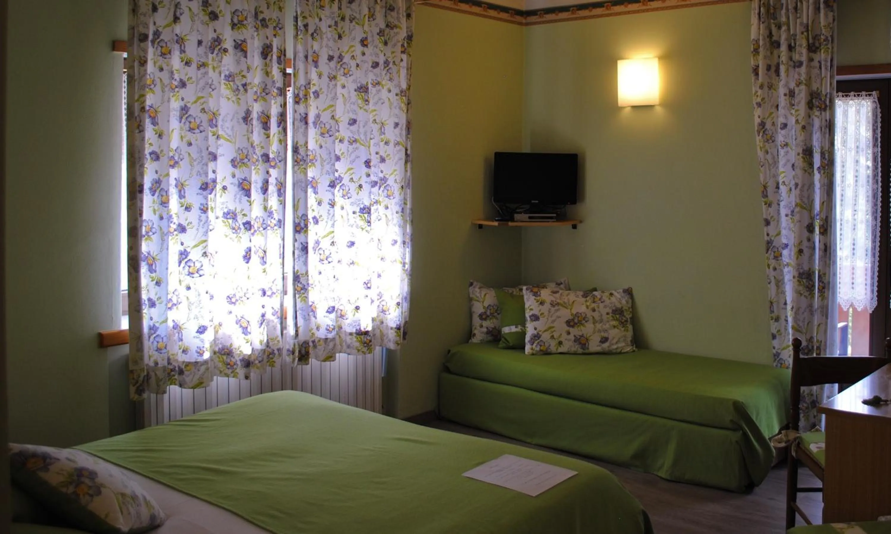 Bed in Monaco Sport Hotel