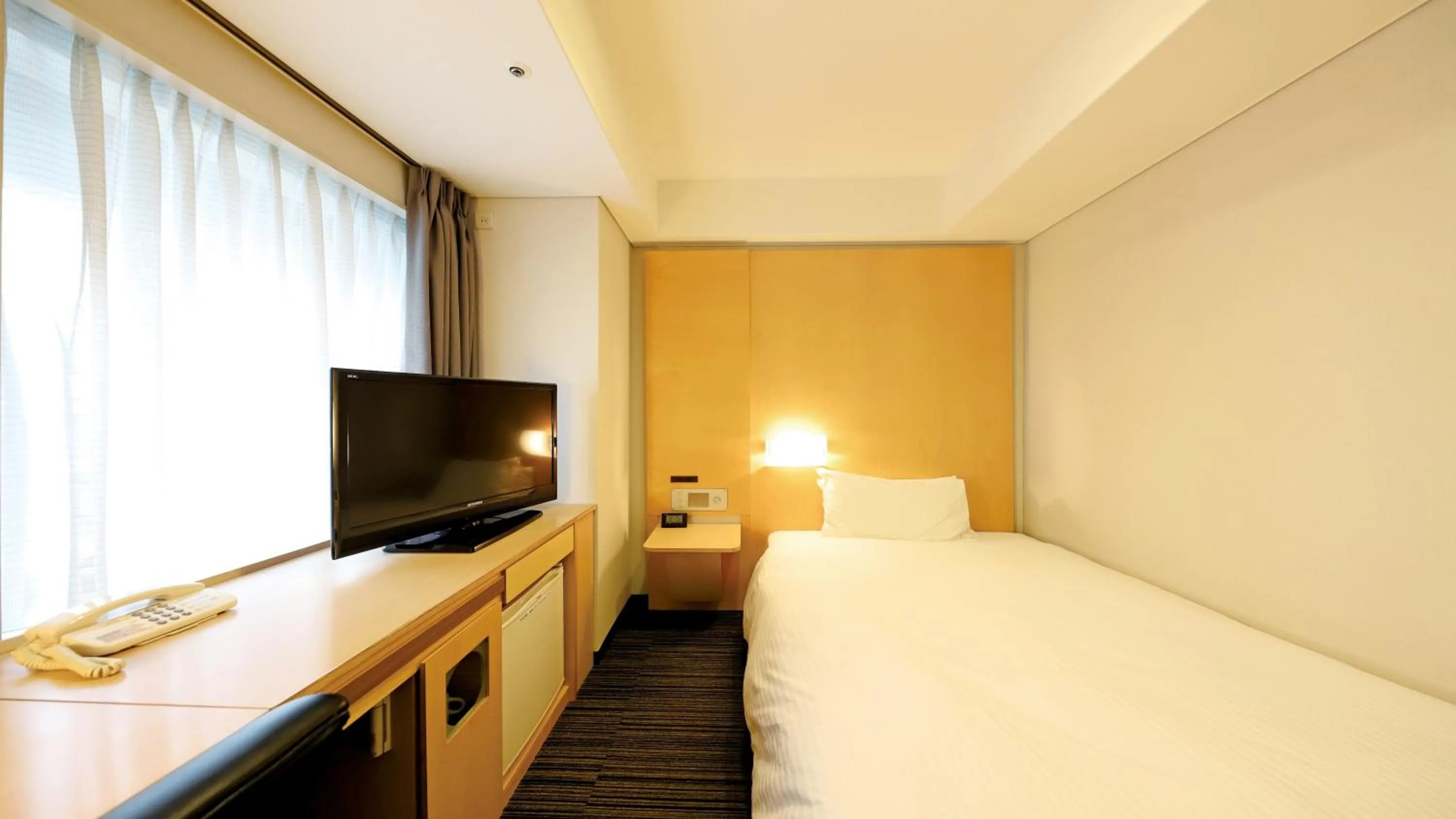 Photo of the whole room, Bed in Smile Hotel Osaka Yotsubashi