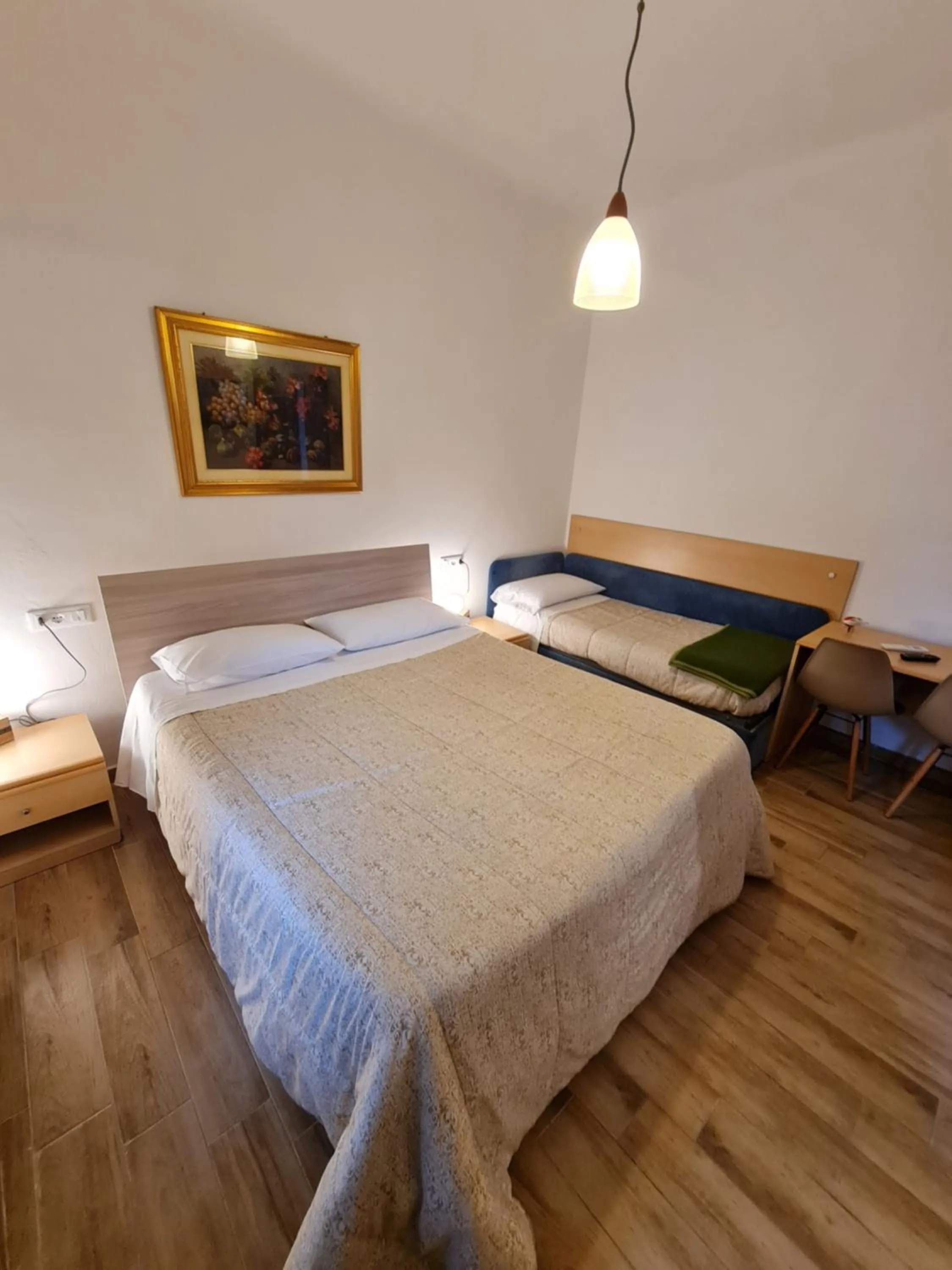 View (from property/room), Bed in Albergo Genio