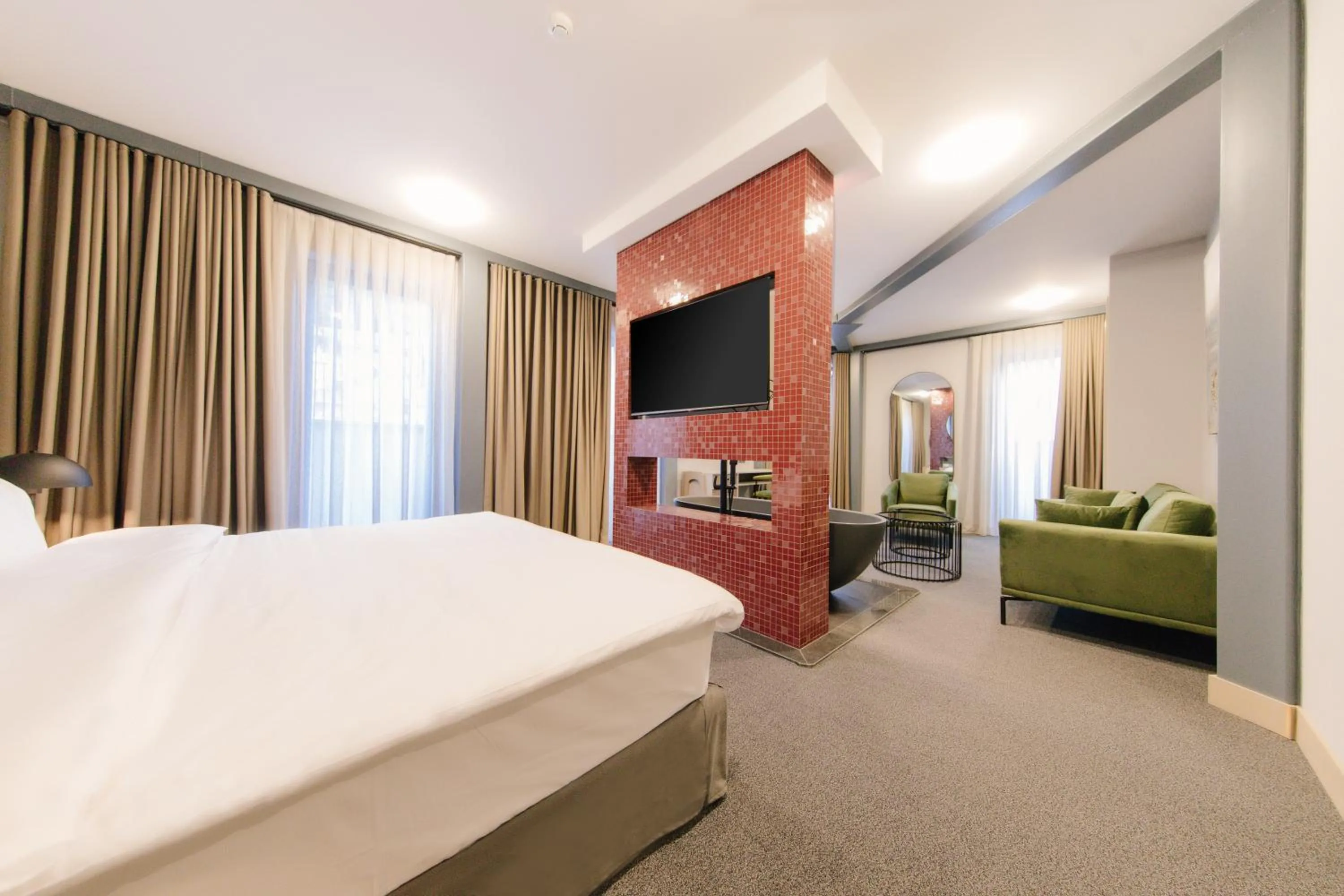 Bed in STROFI Boutique Hotel