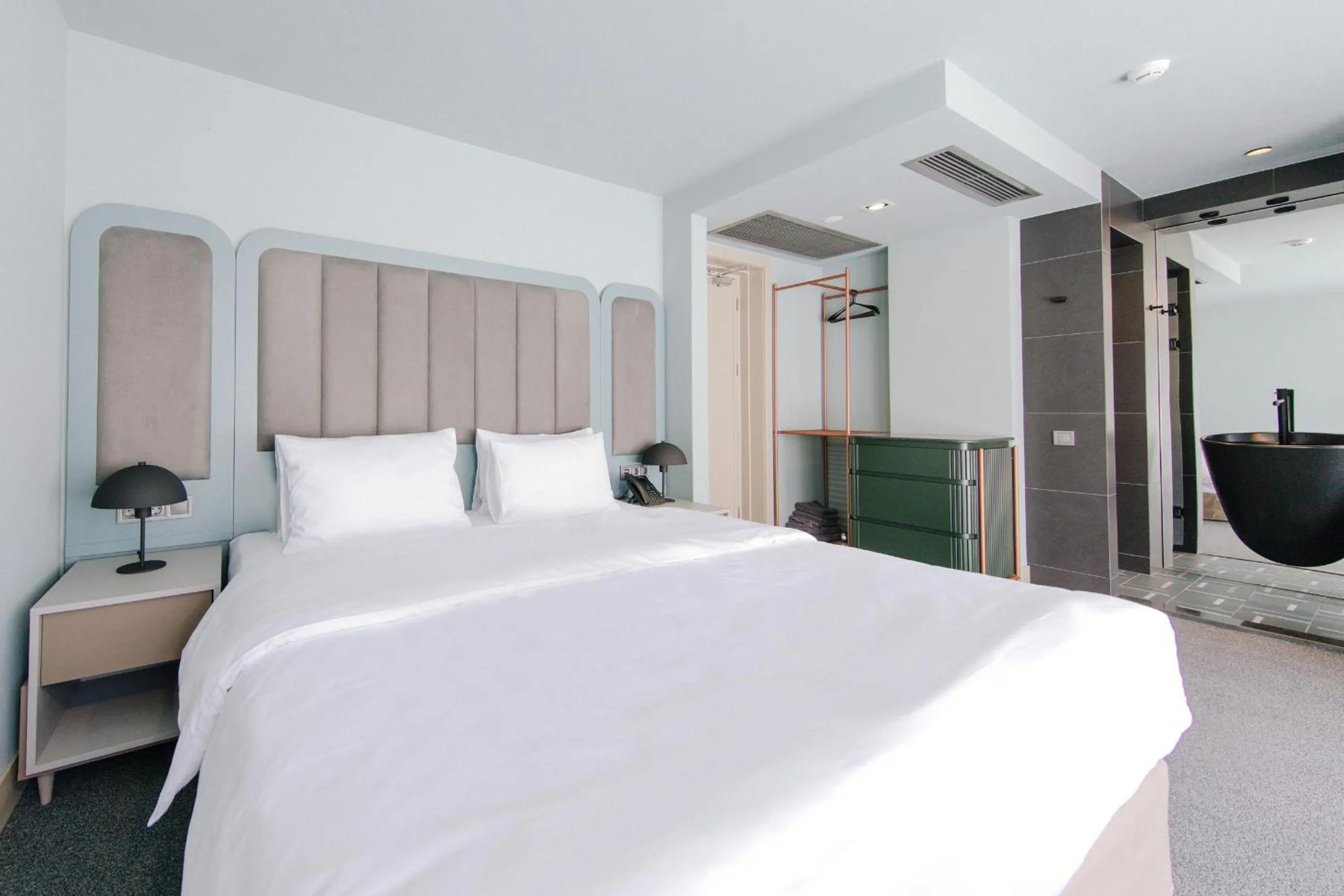 Bed in STROFI Boutique Hotel