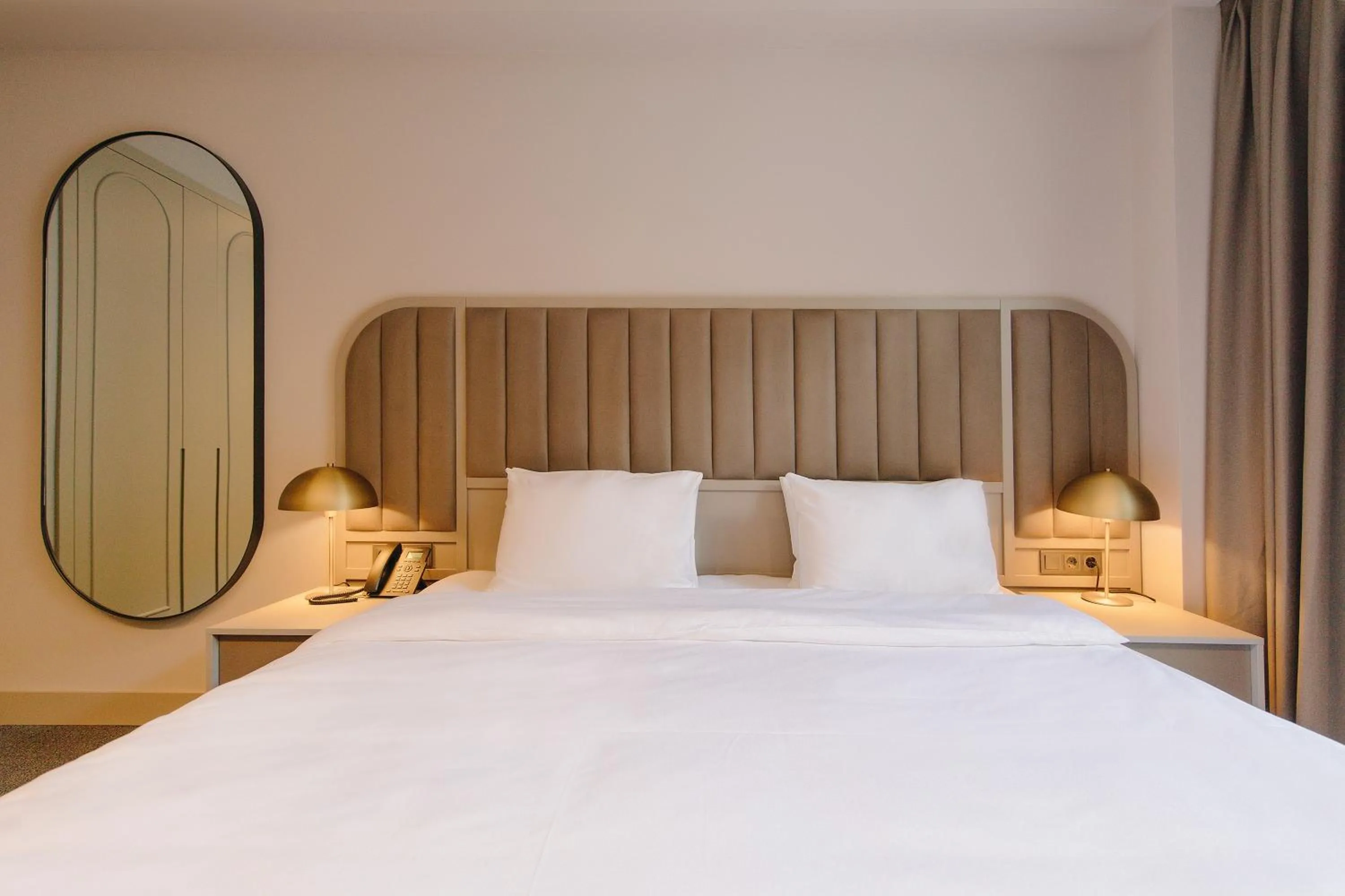 Bed in STROFI Boutique Hotel