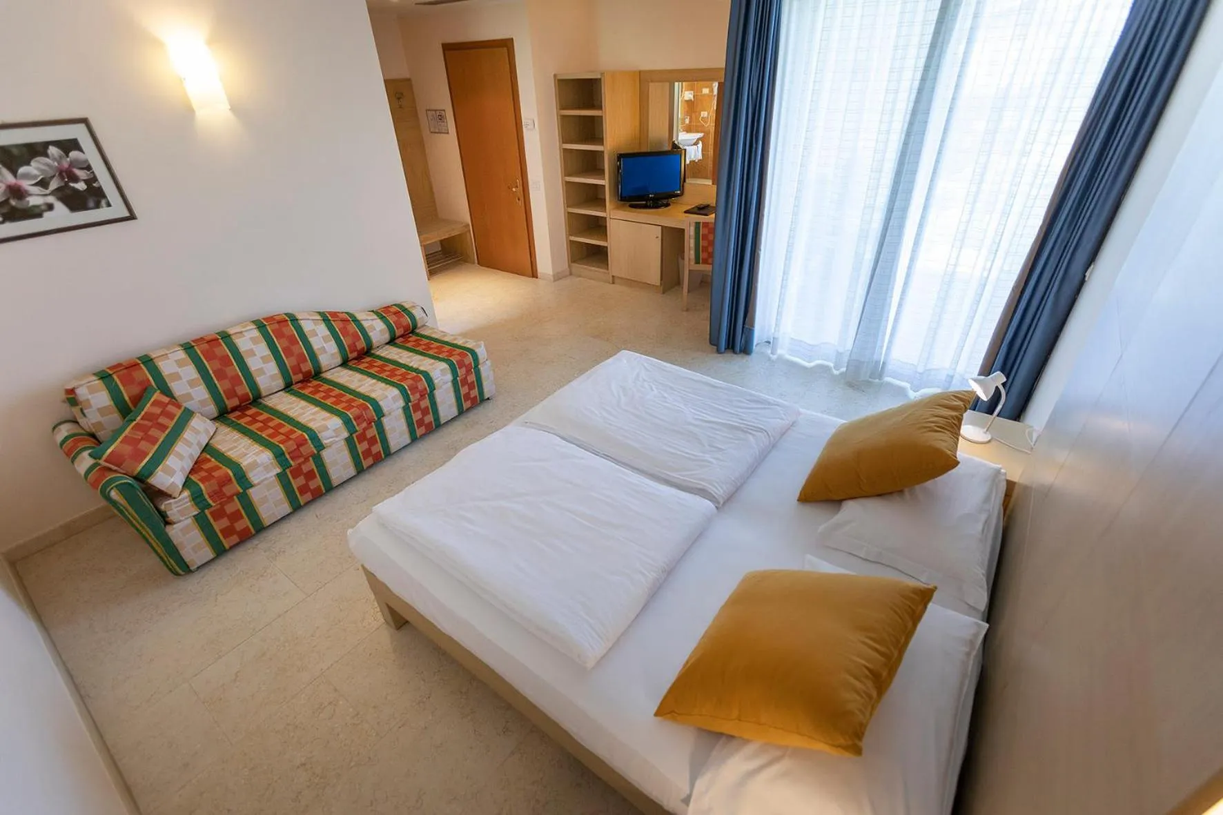 Bed in Hotel Garnì Orchidea