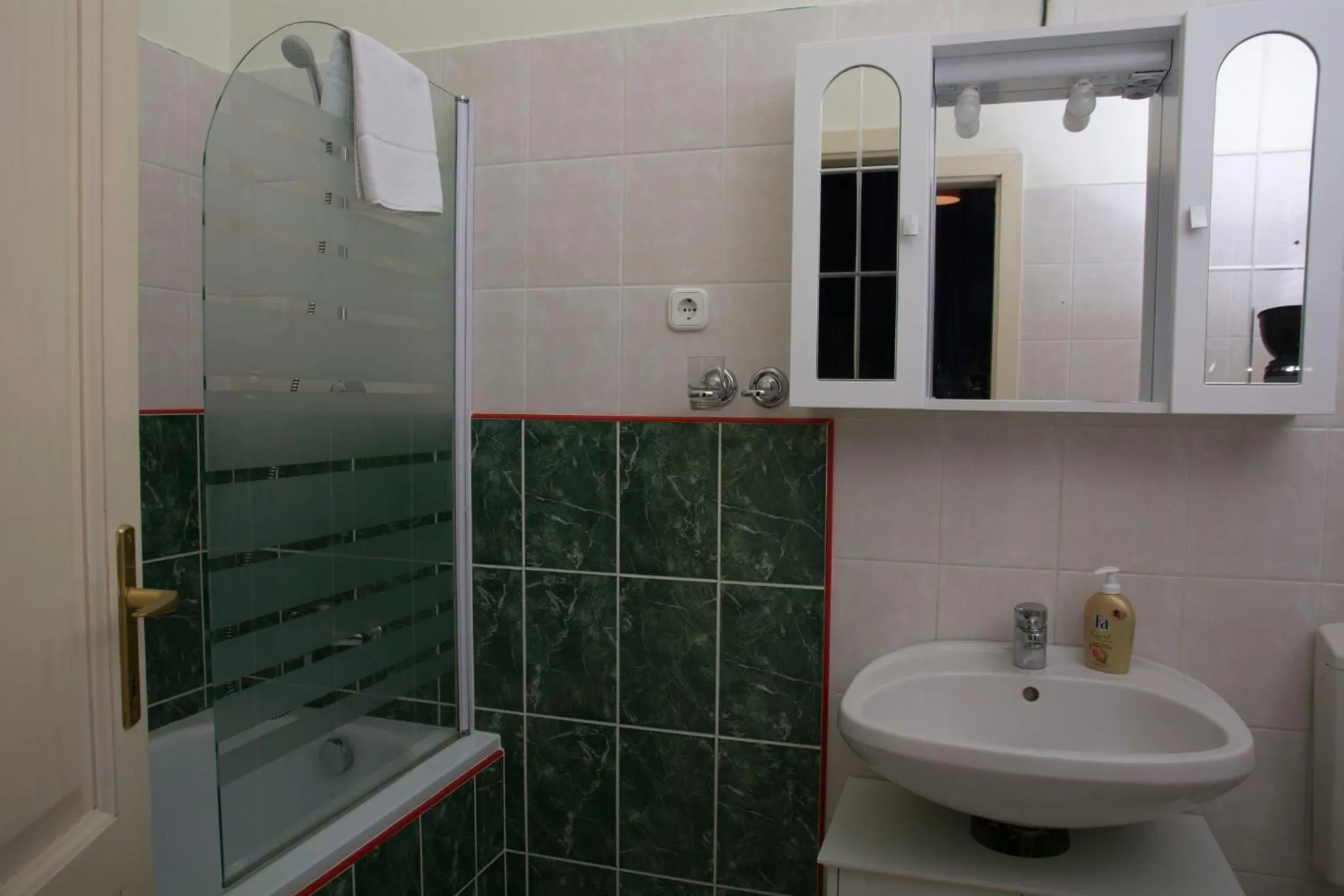 Shower in Vibrant 3 Bedroom Apartment In The Pulsing Heart Of Budapest