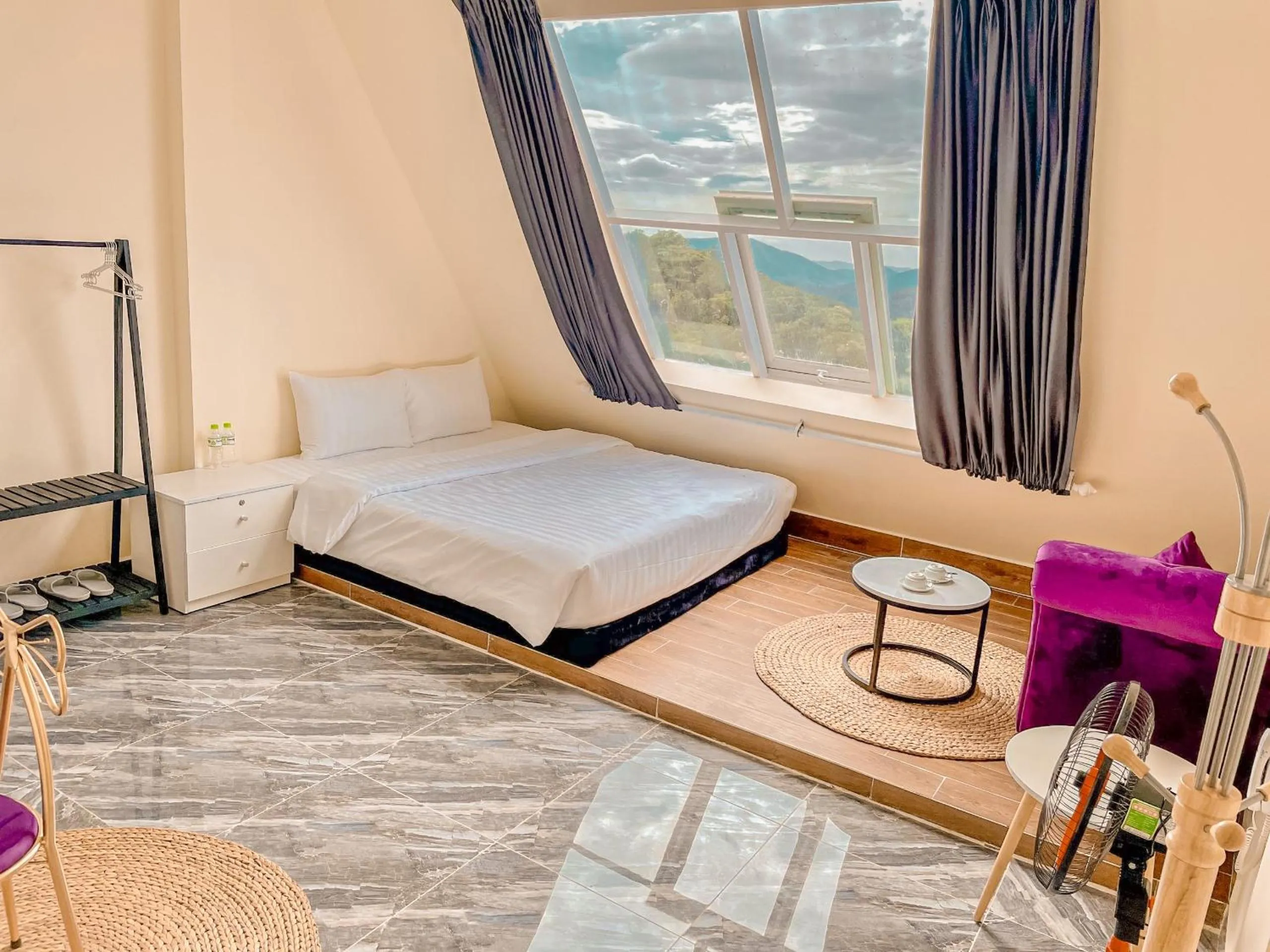 Bed in SHIN VILLAGE HOTEL