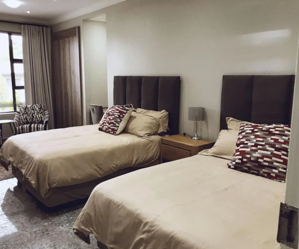 Photo of the whole room, Bed in Furaha Guest Lodge