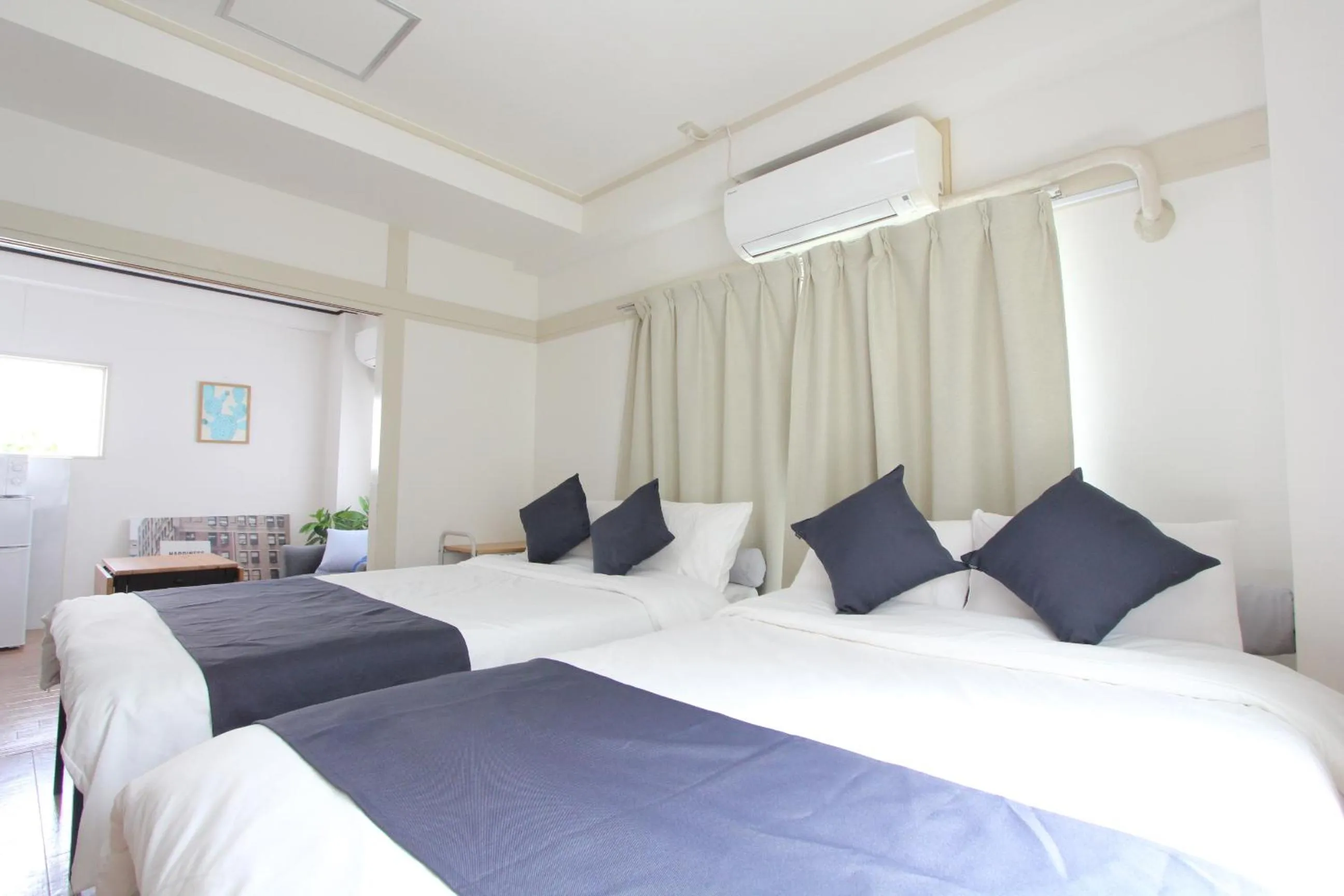 Bed in LUANAHOTEL IN WASEDA