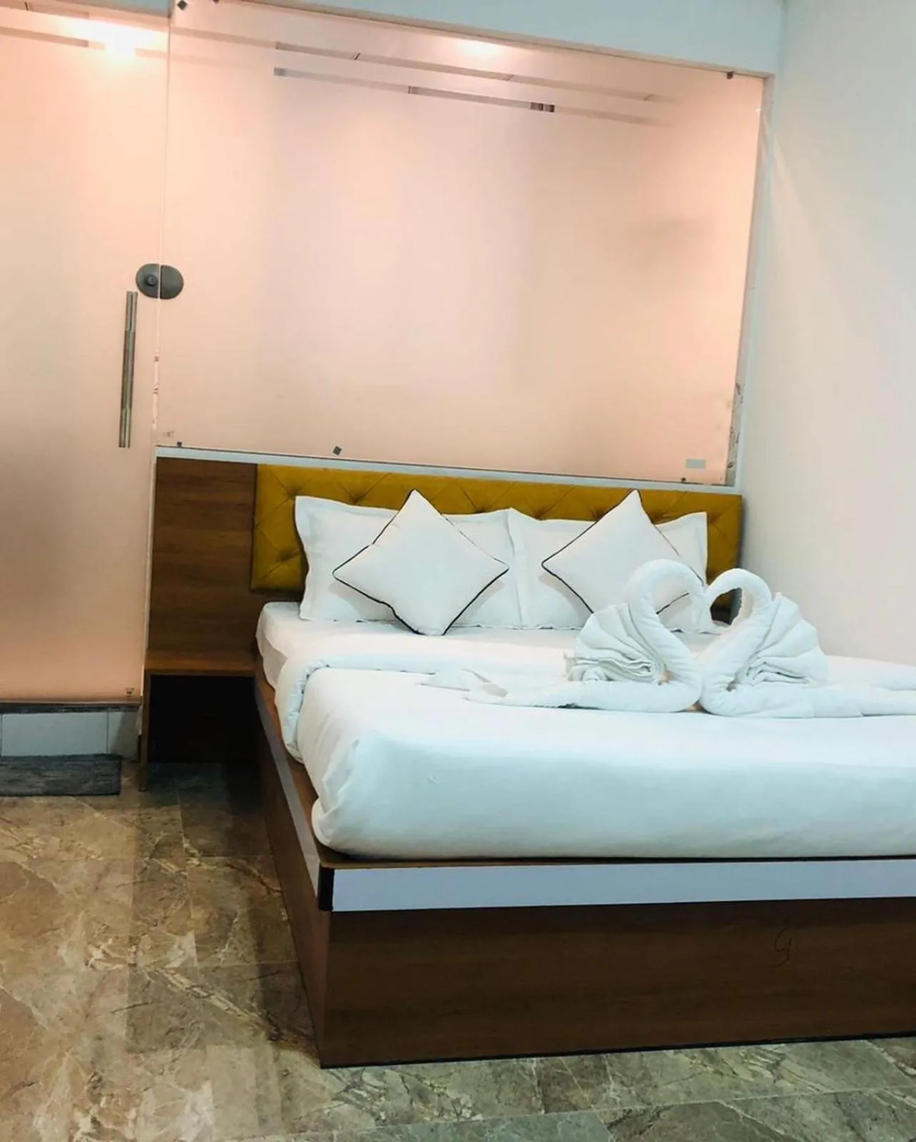 Bed in Hotel Santeria Inn, Best Luxurious Hotel AC Rooms In Surat