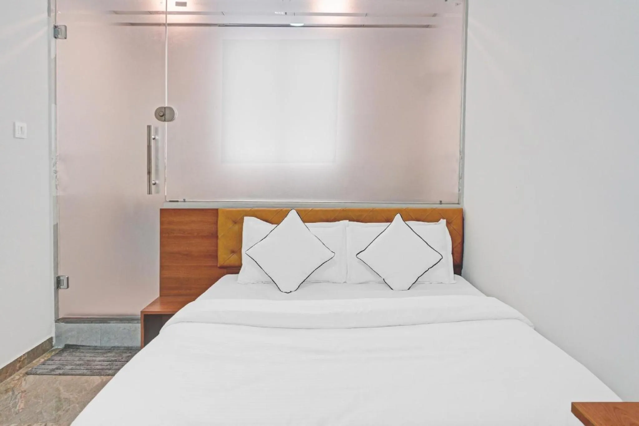 Bed in Hotel Santeria Inn, Best Luxurious Hotel AC Rooms In Surat