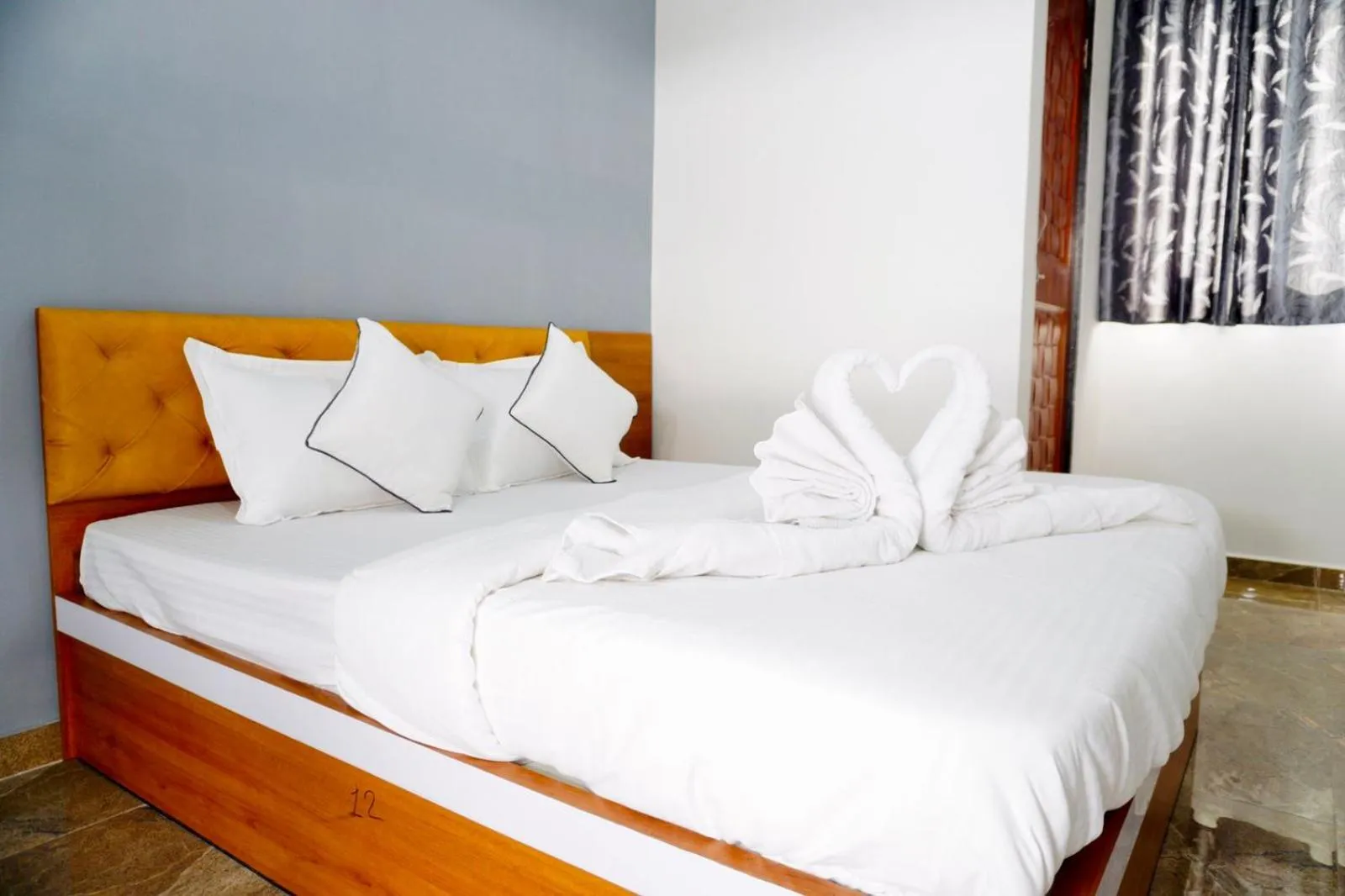 Bed in Hotel Santeria Inn, Best Luxurious Hotel AC Rooms In Surat