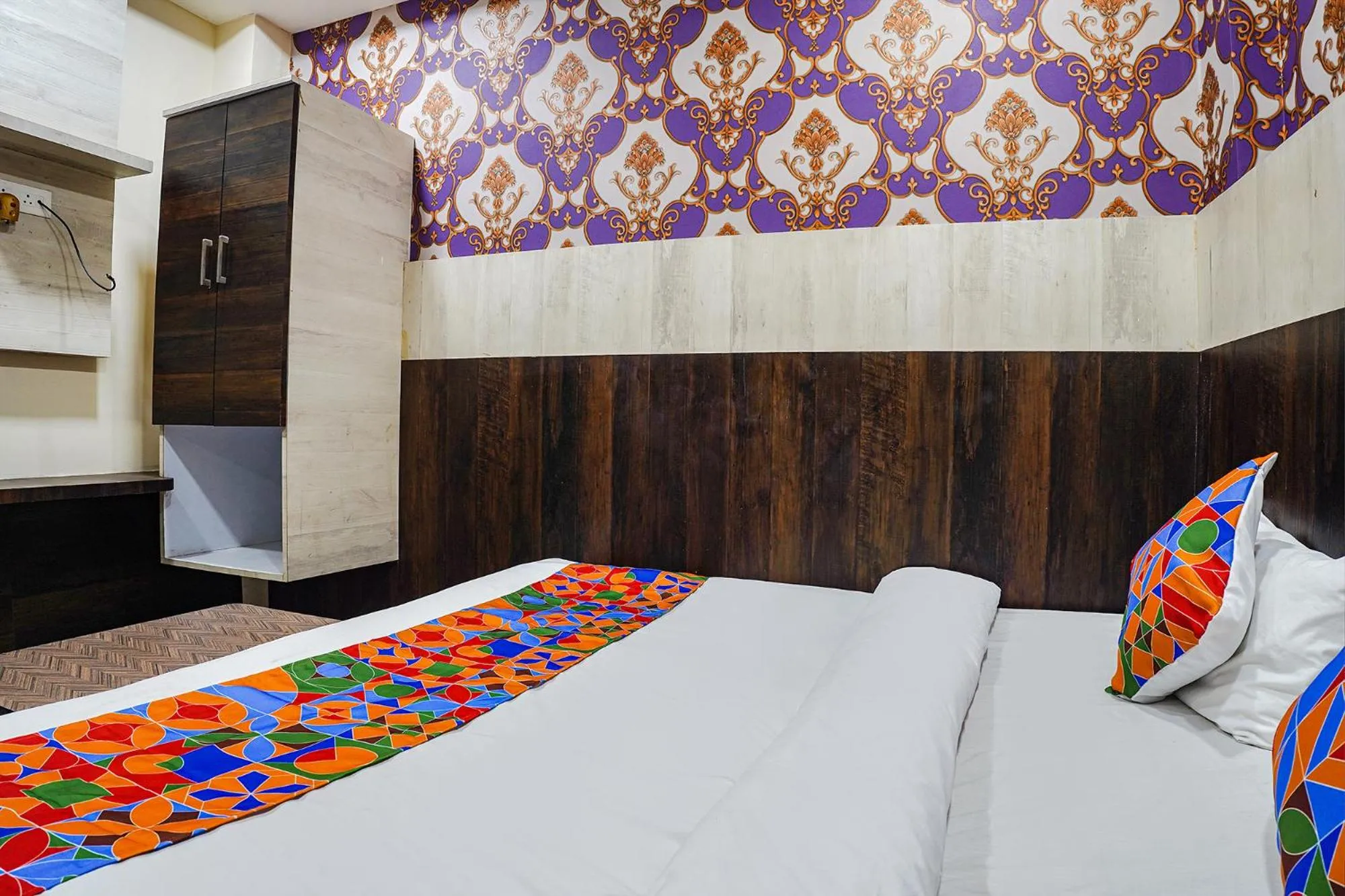Bed in FabHotel Brij Residency