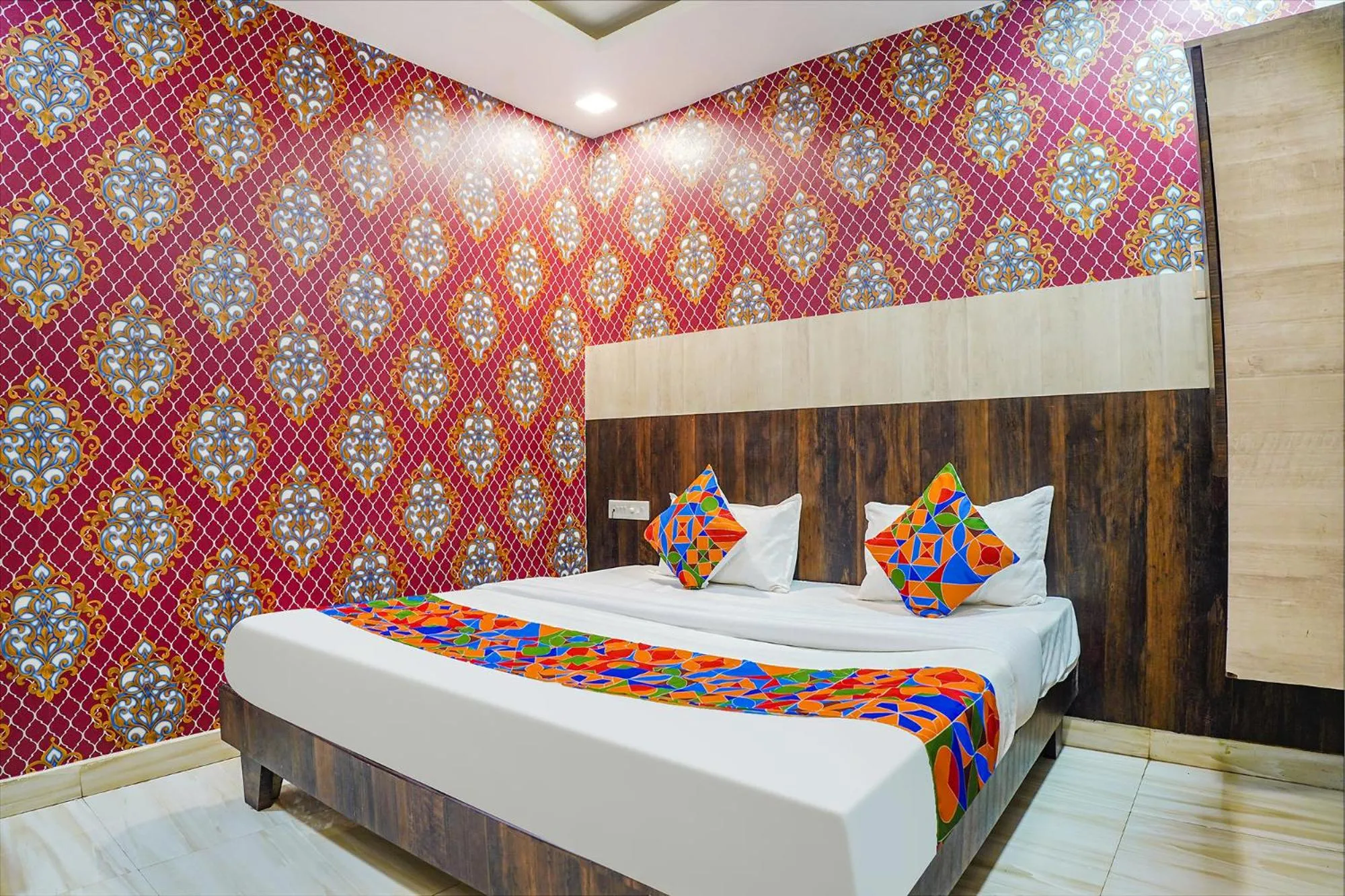 Bed in FabHotel Brij Residency