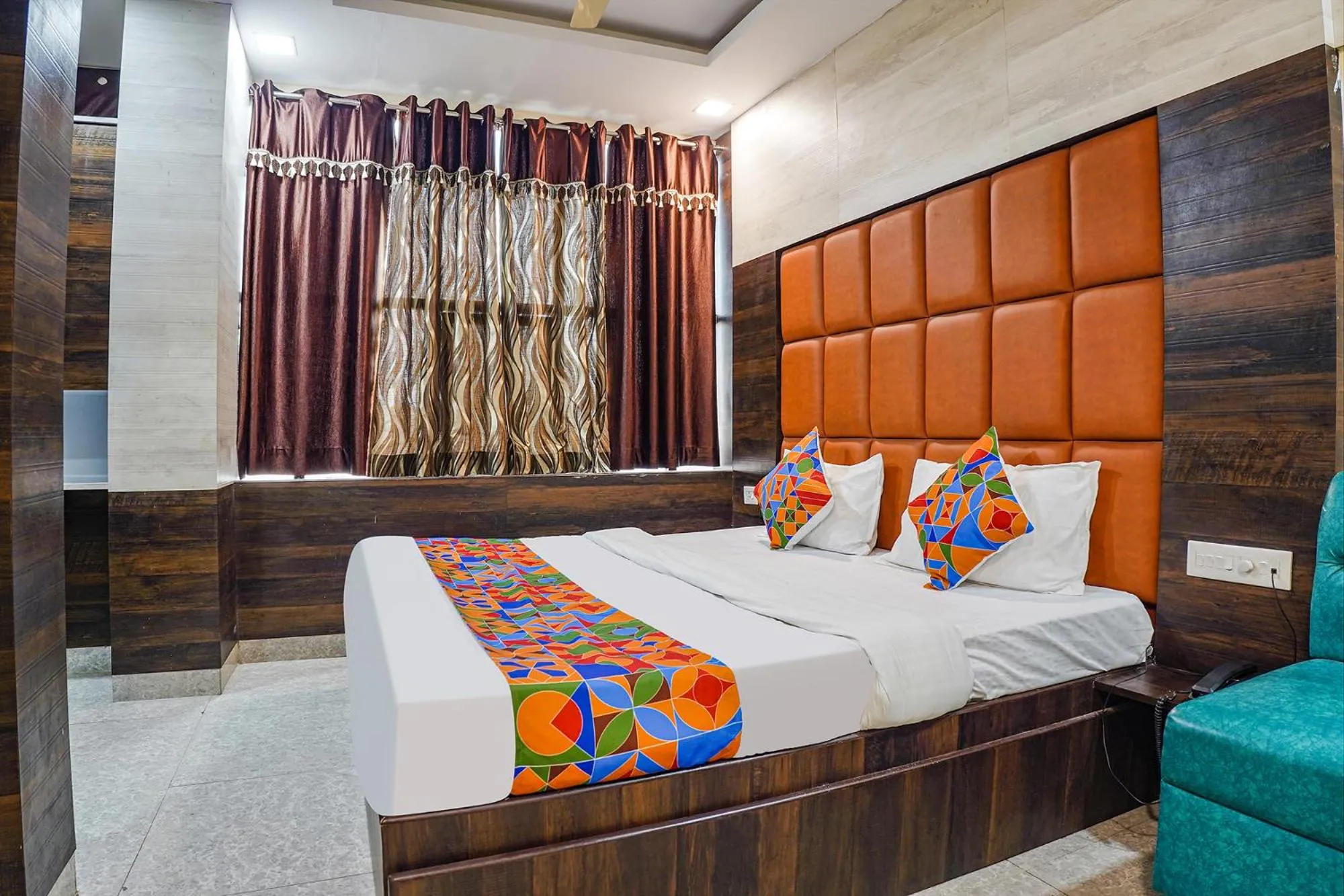 Bed in FabHotel Brij Residency